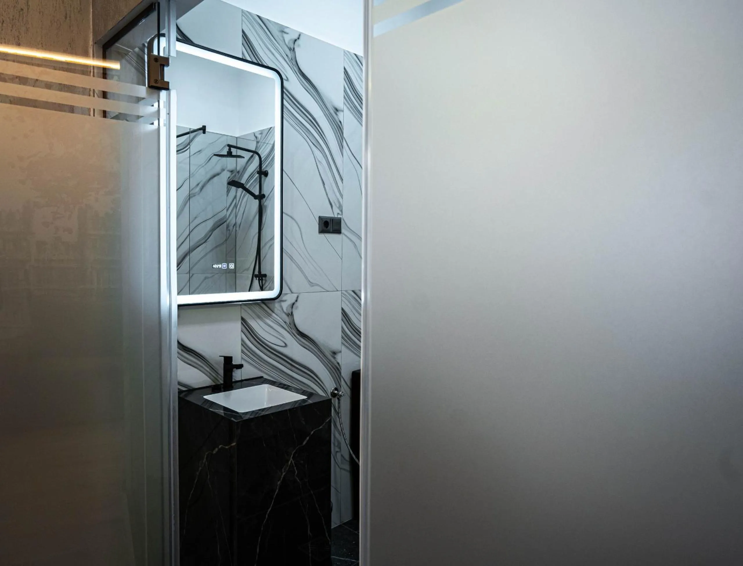 Bathroom in City Boutique Hotel Reghin