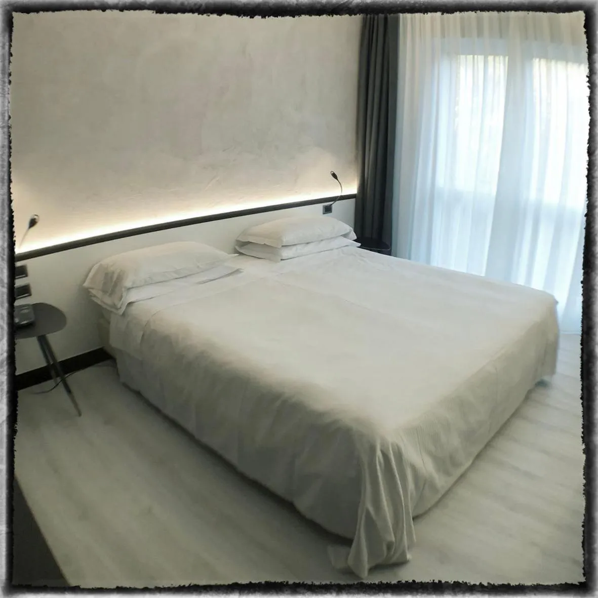 Bed in Brianteo Hotel Residence and Restaurant