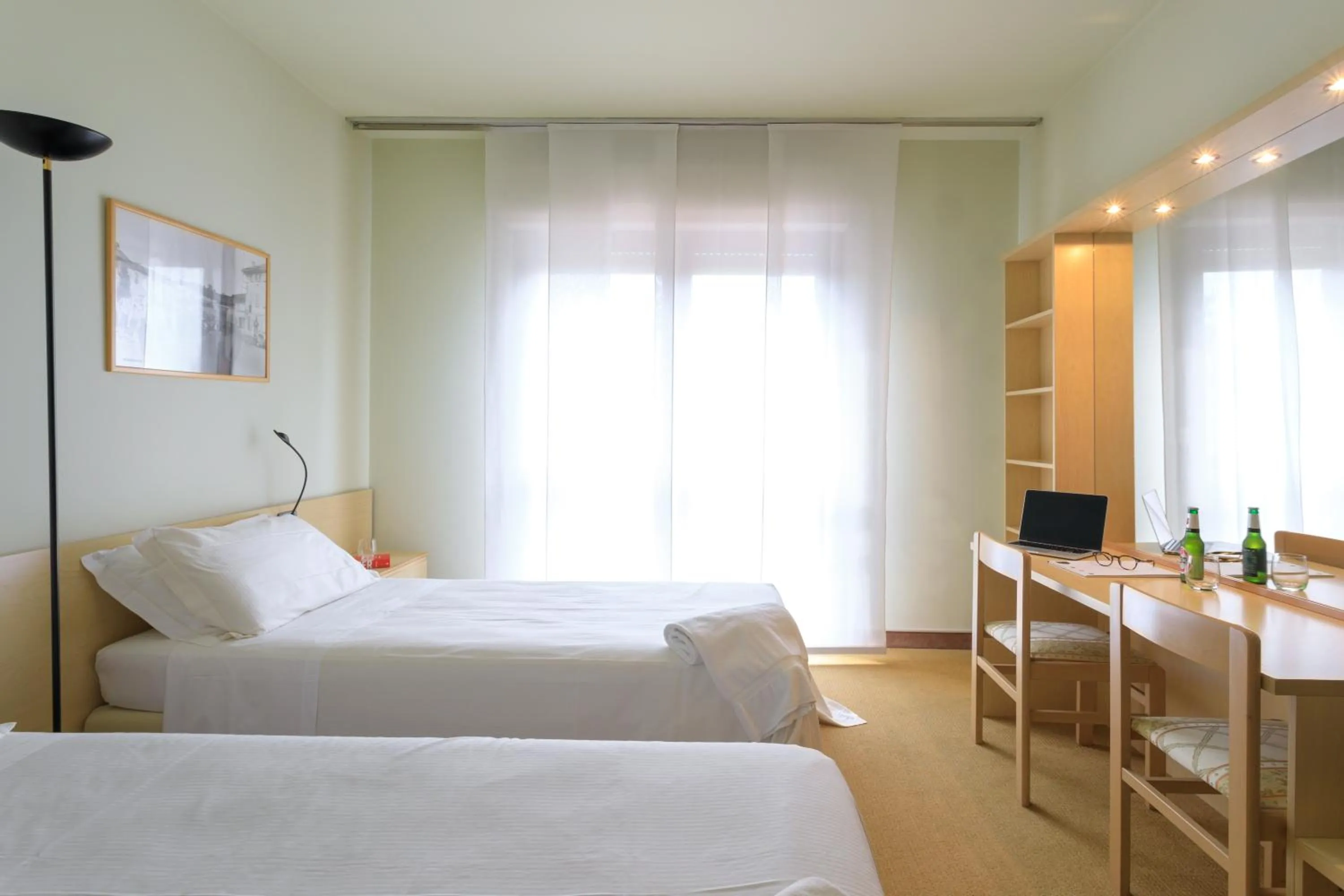 Bed in Brianteo Hotel Residence and Restaurant