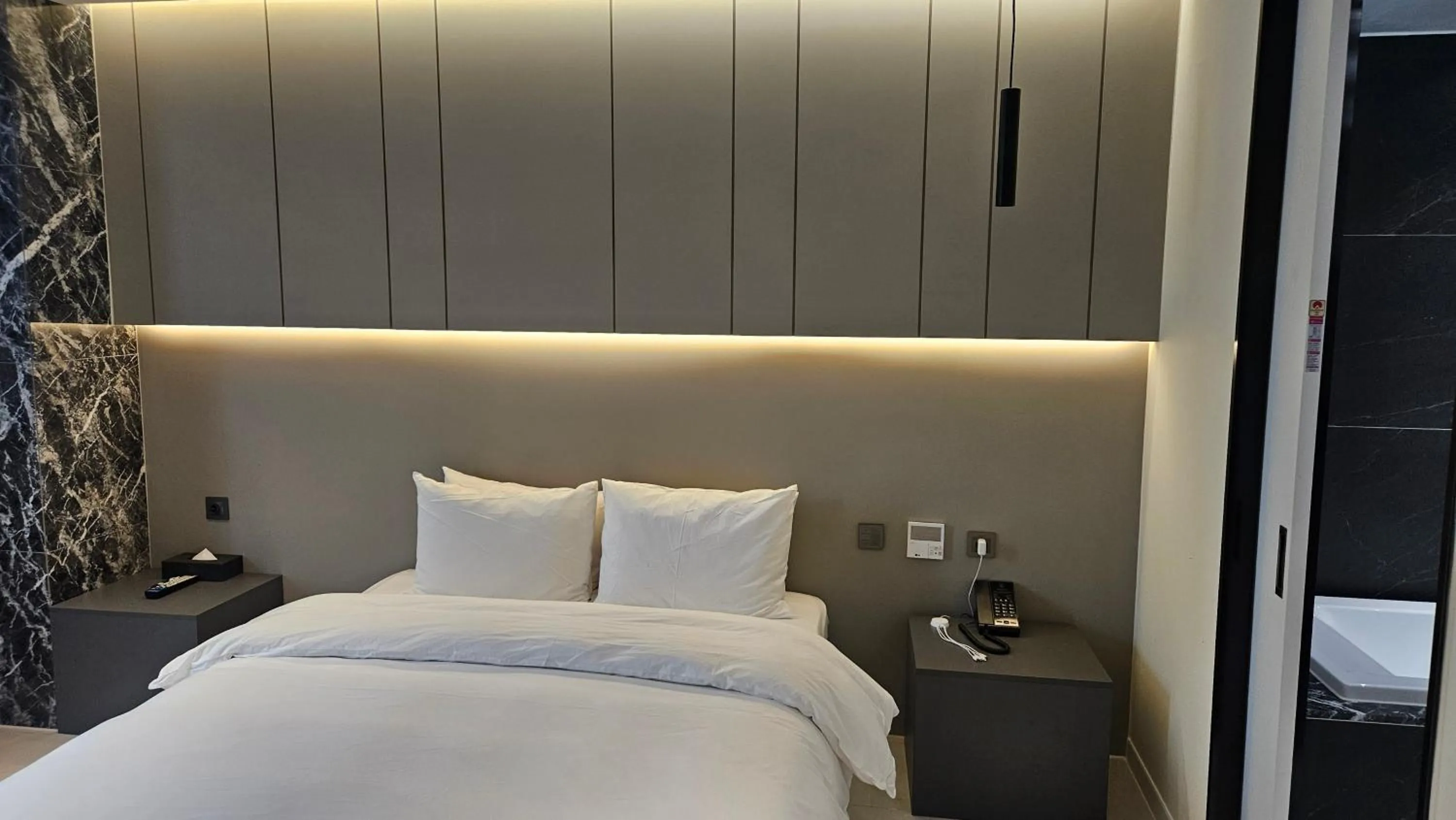 Bed in The Gleam Hotel