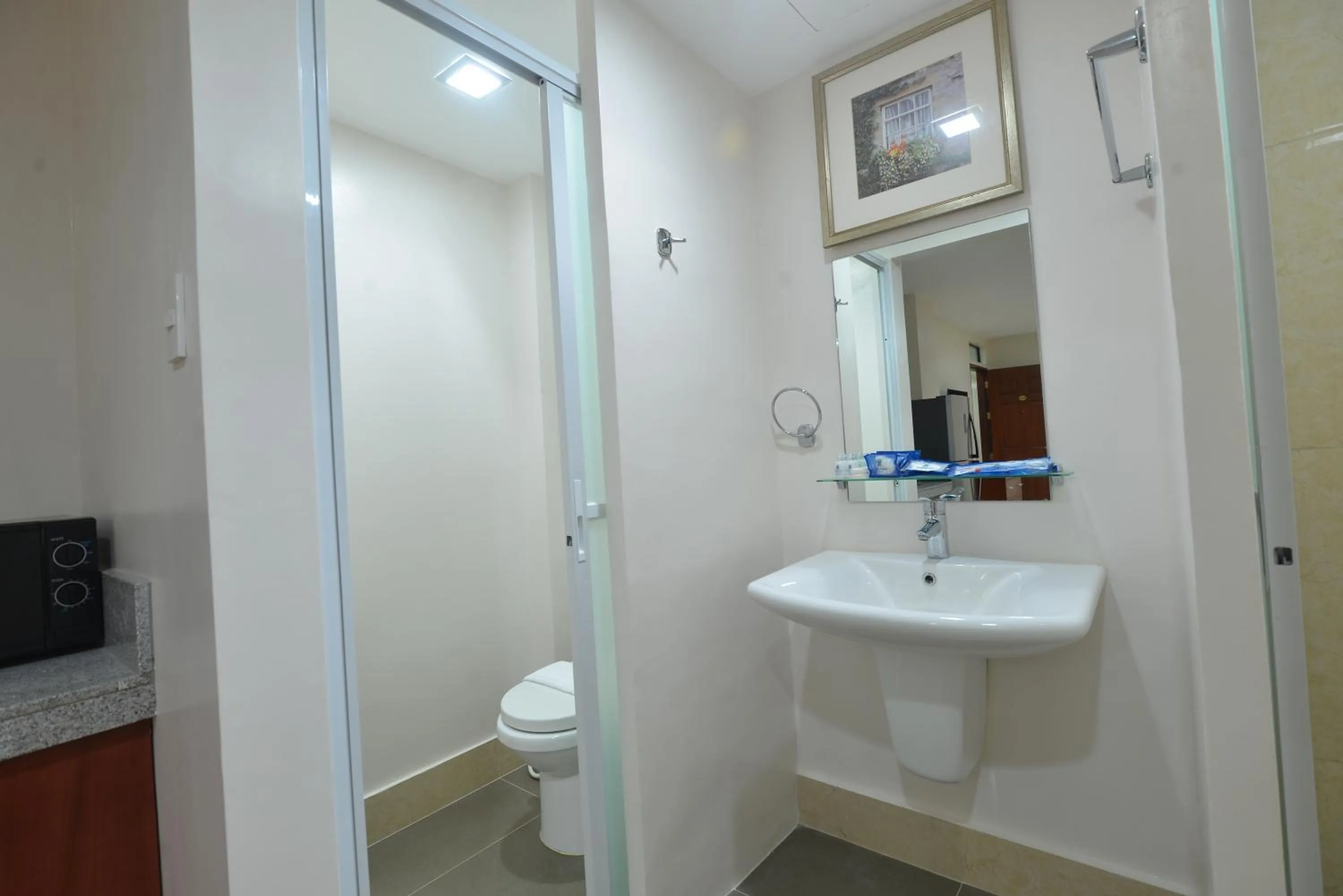 Toilet in Royal Suites Condotel