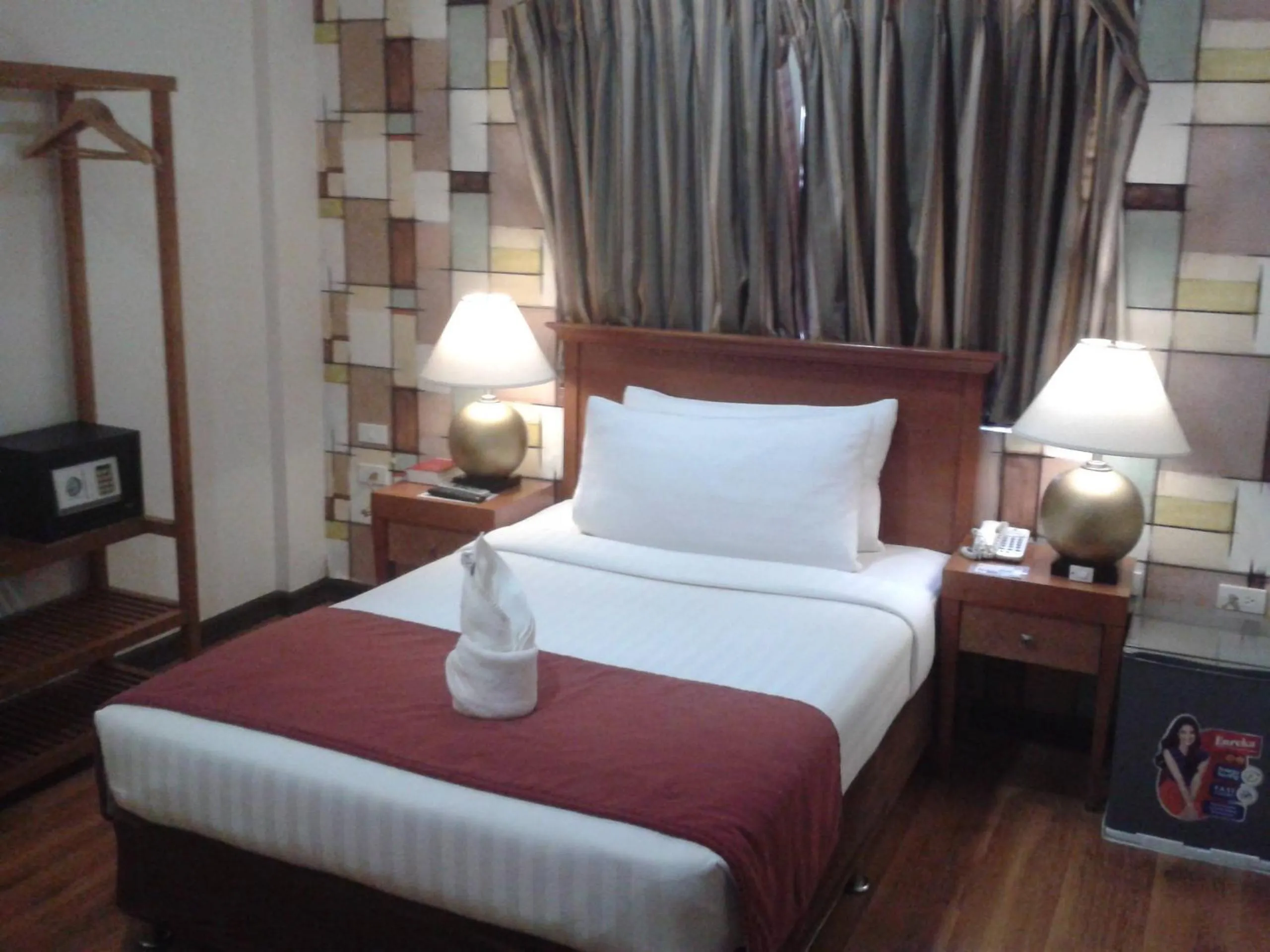 Bed in Royal Suites Condotel