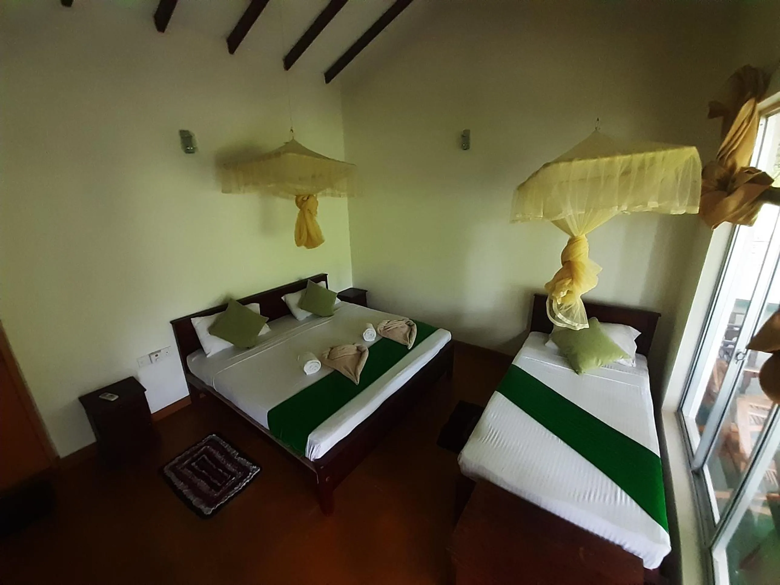 Photo of the whole room, Bed in Banana Rest Sigiriya