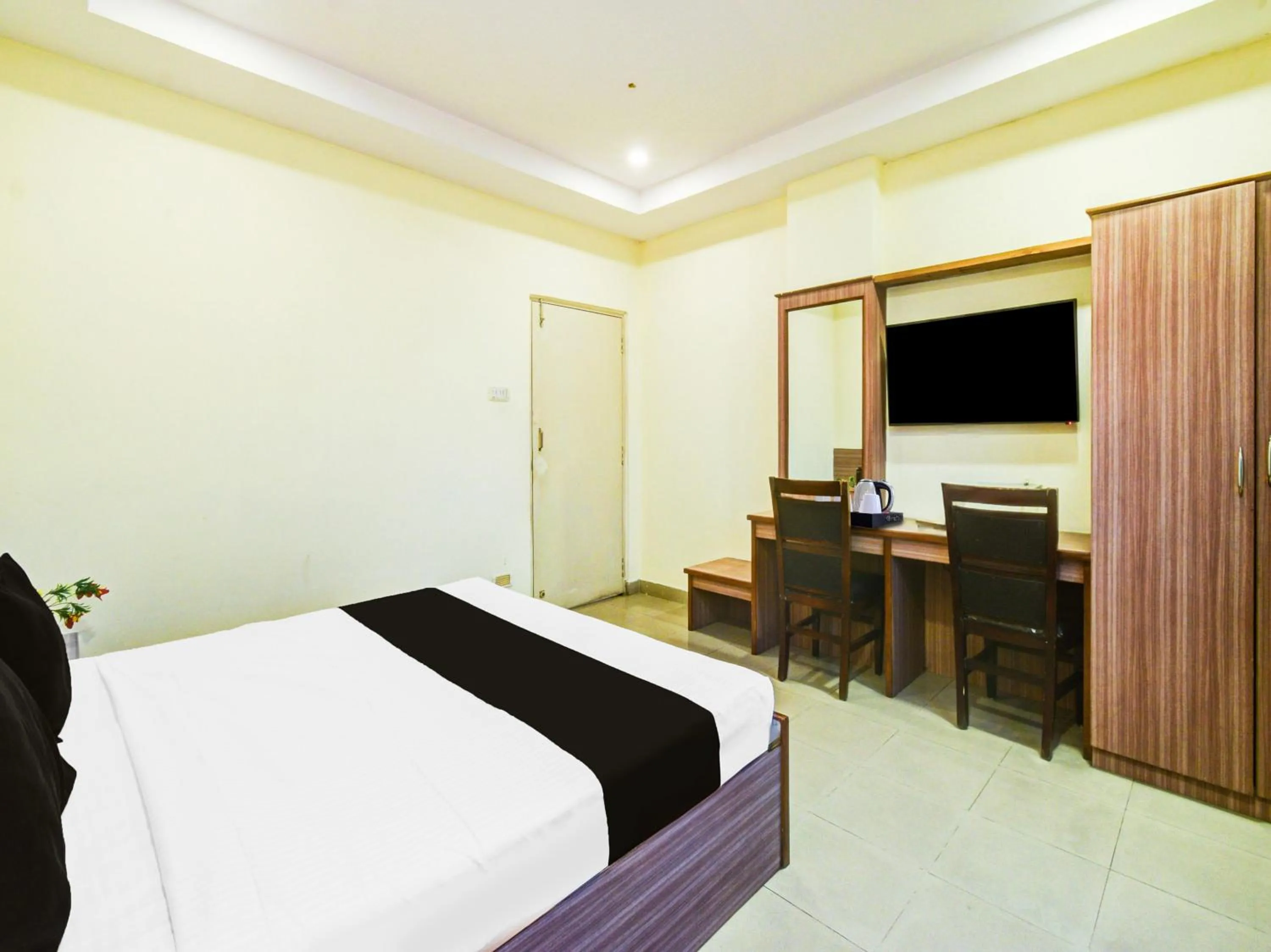 Bedroom in Super Townhouse Red Hills Lakdikapul Formerly Sitara Grand
