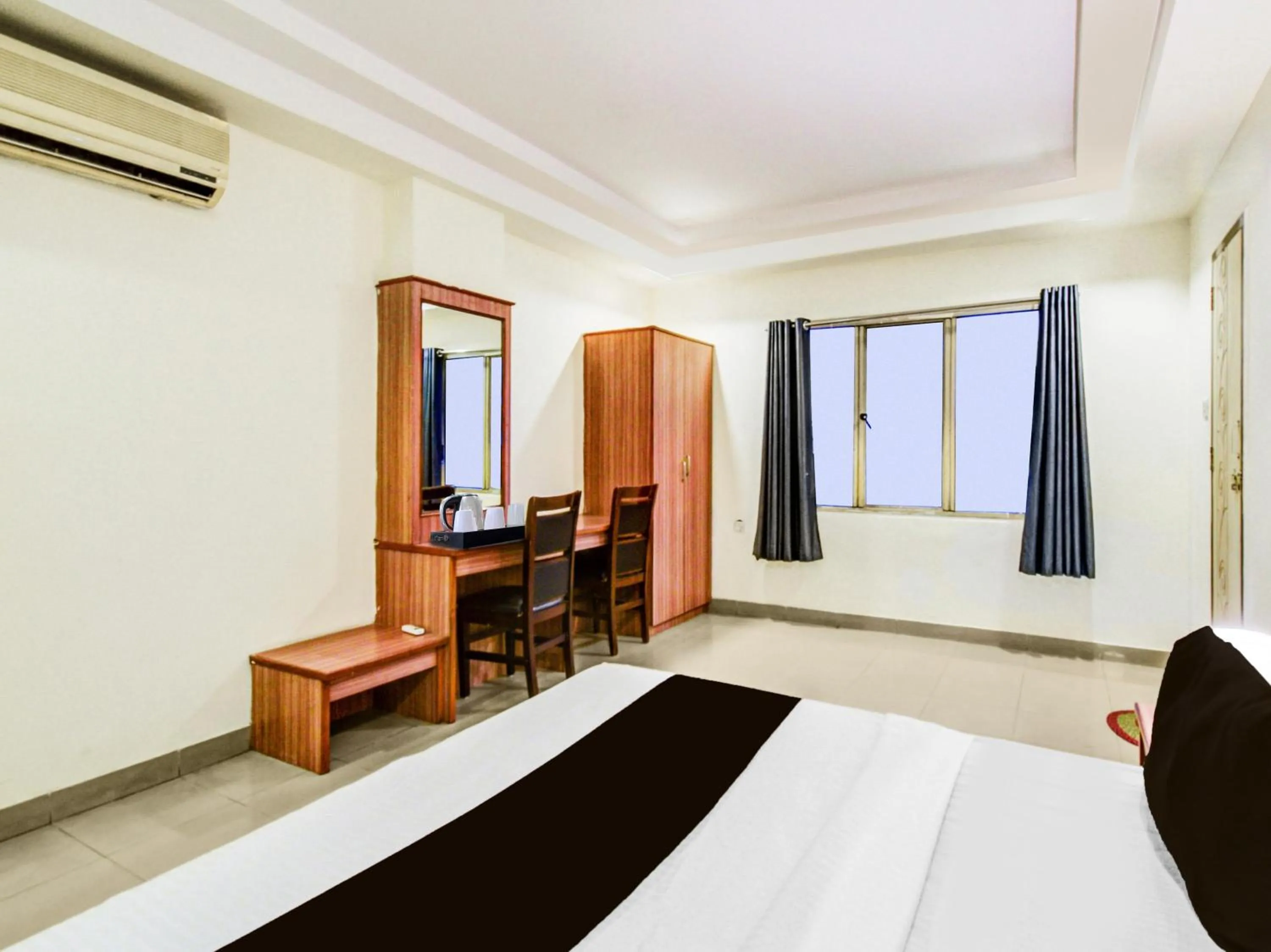 Bedroom in Super Townhouse Red Hills Lakdikapul Formerly Sitara Grand