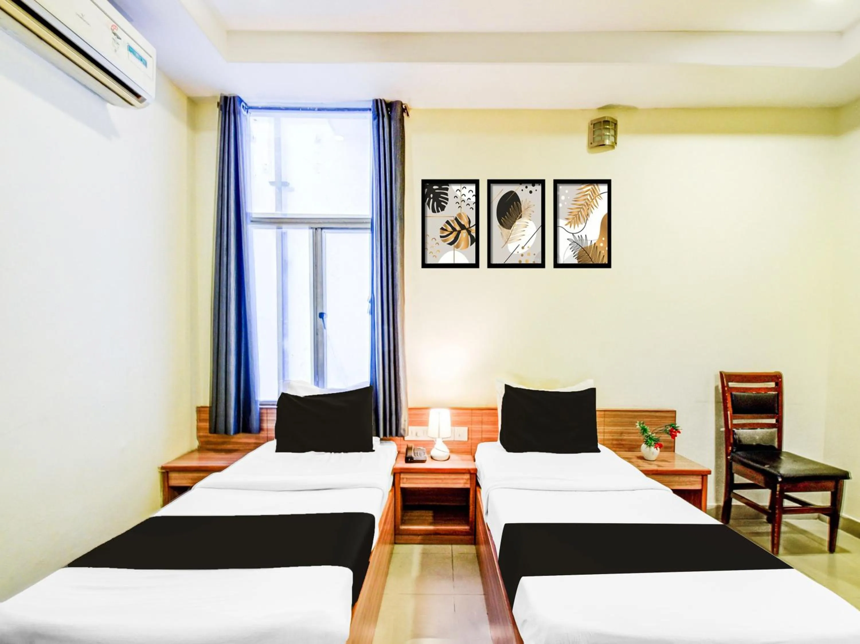Bedroom in Super Townhouse Red Hills Lakdikapul Formerly Sitara Grand
