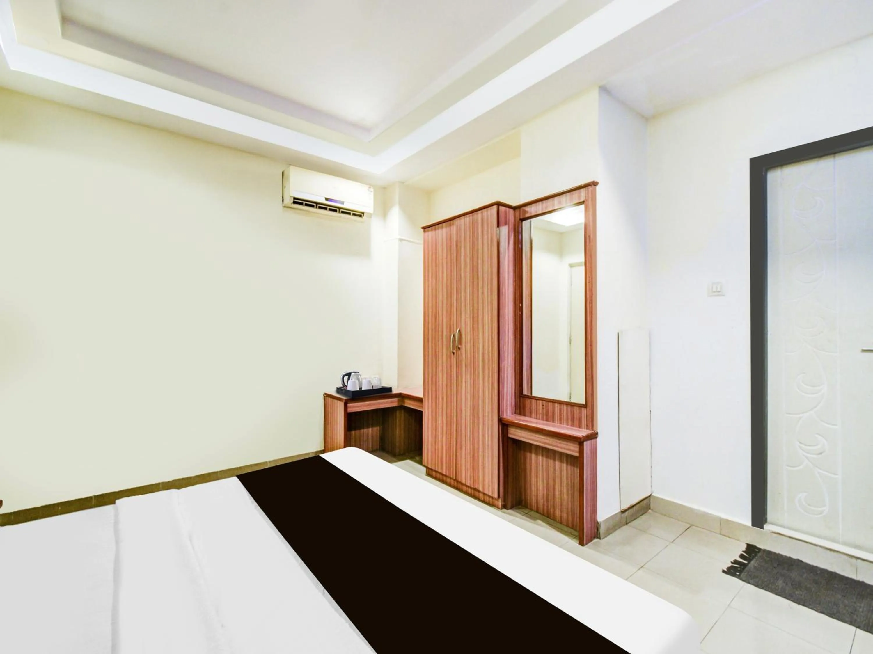 Bedroom in Super Townhouse Red Hills Lakdikapul Formerly Sitara Grand