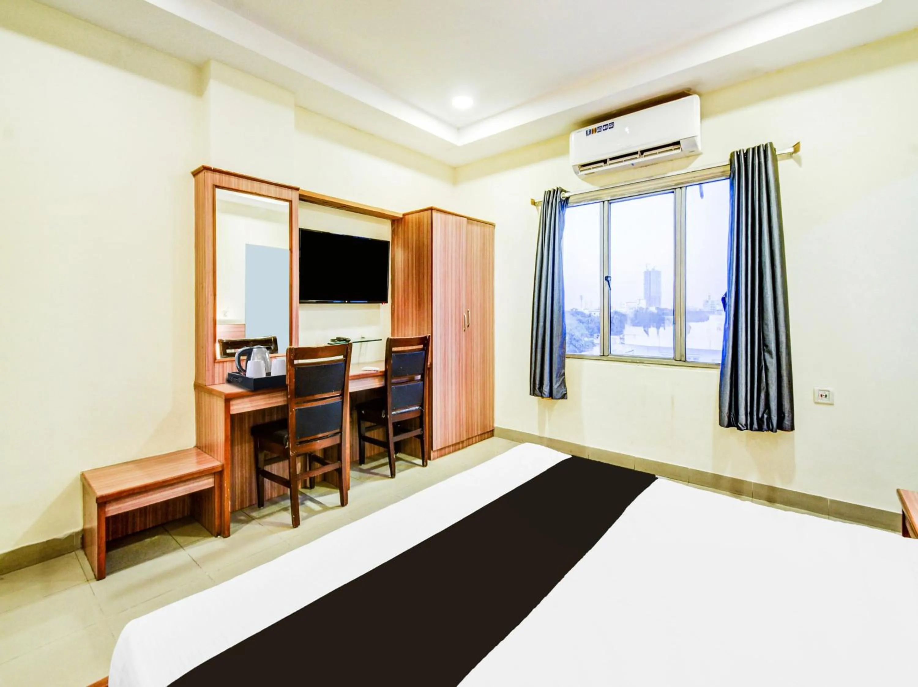 Bedroom in Super Townhouse Red Hills Lakdikapul Formerly Sitara Grand