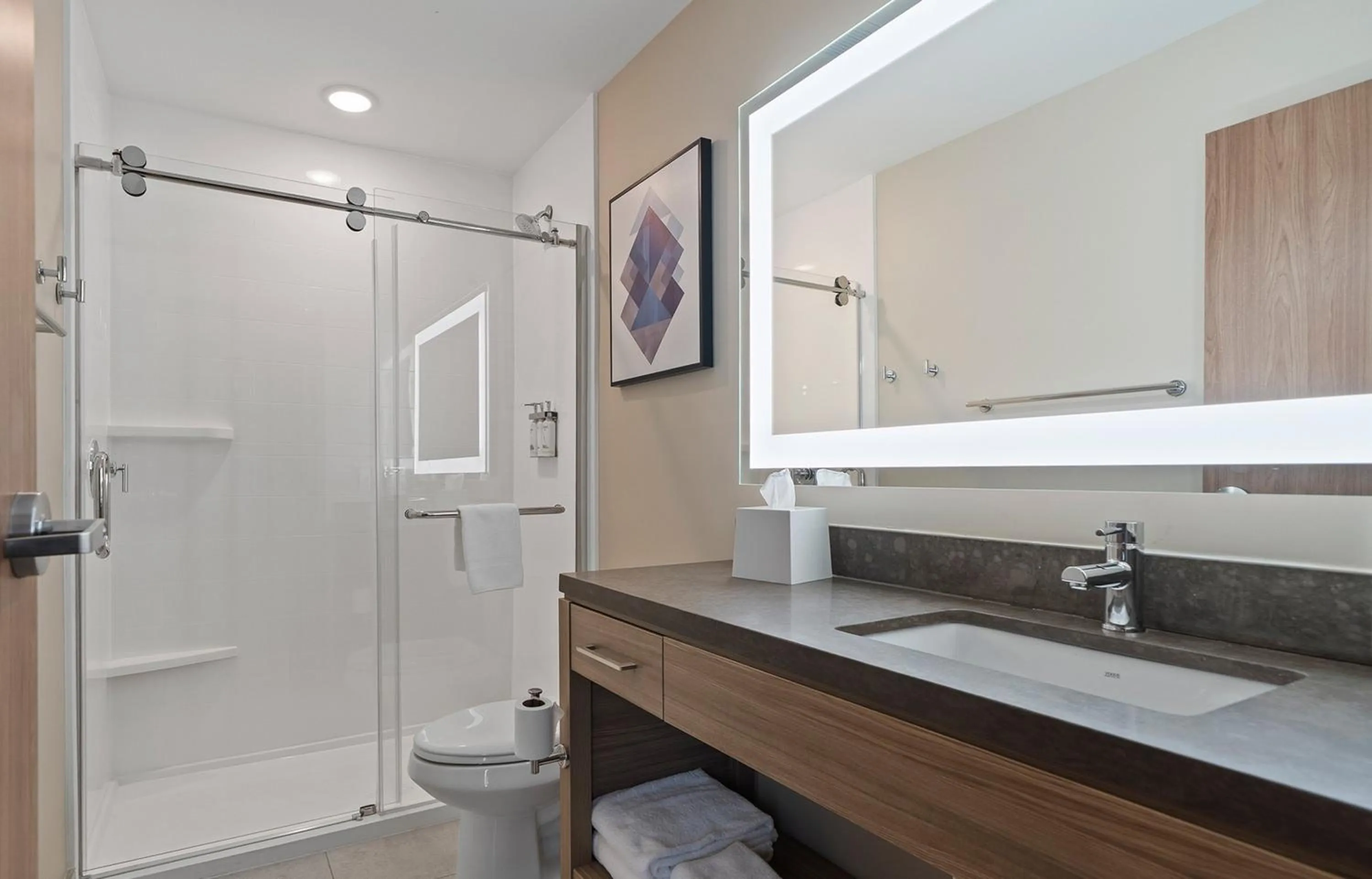 Bathroom in Candlewood Suites Perry-National Fairground Area by IHG