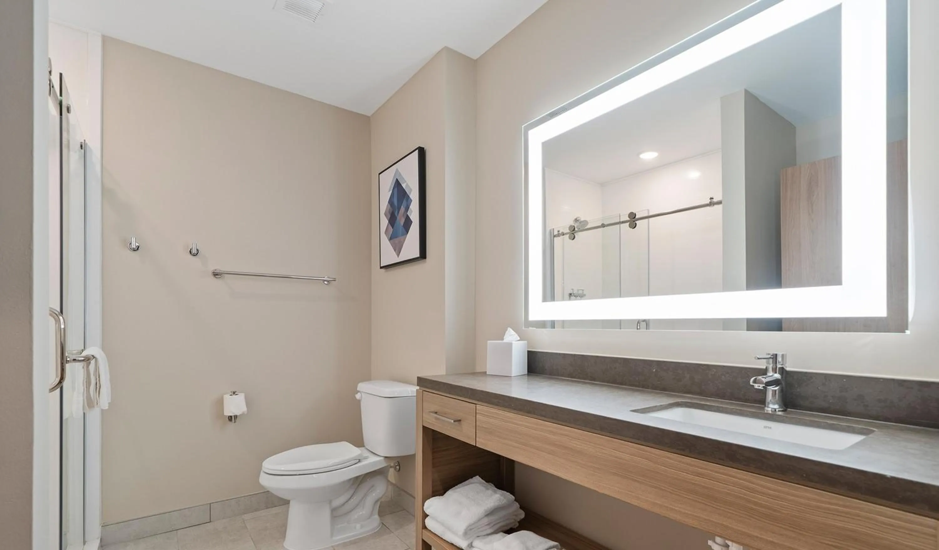 Bathroom in Candlewood Suites Perry-National Fairground Area by IHG
