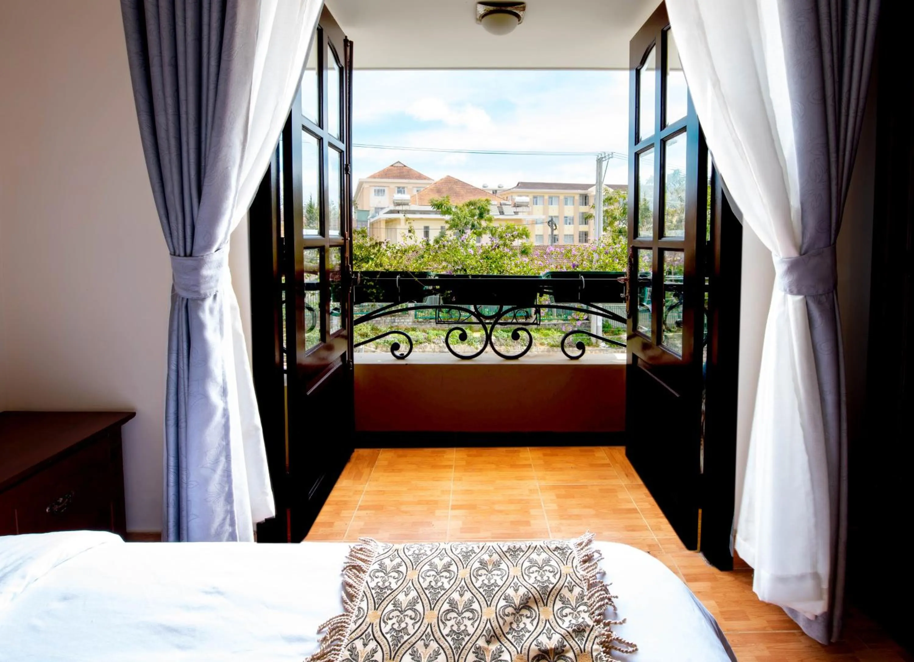 Balcony/Terrace, Bed in Le Petit Paris Dalat Hotel