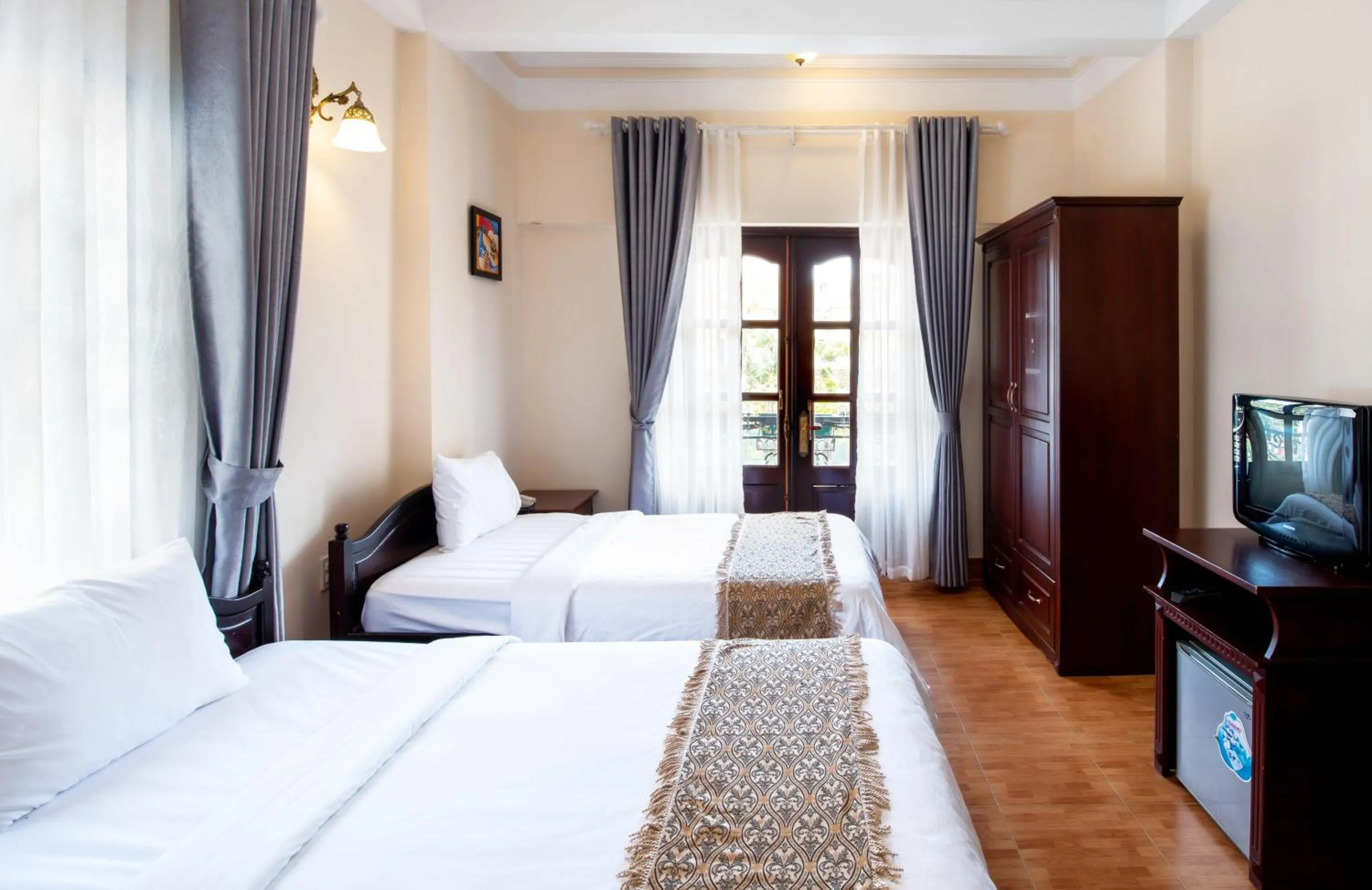 Photo of the whole room, Bed in Le Petit Paris Dalat Hotel