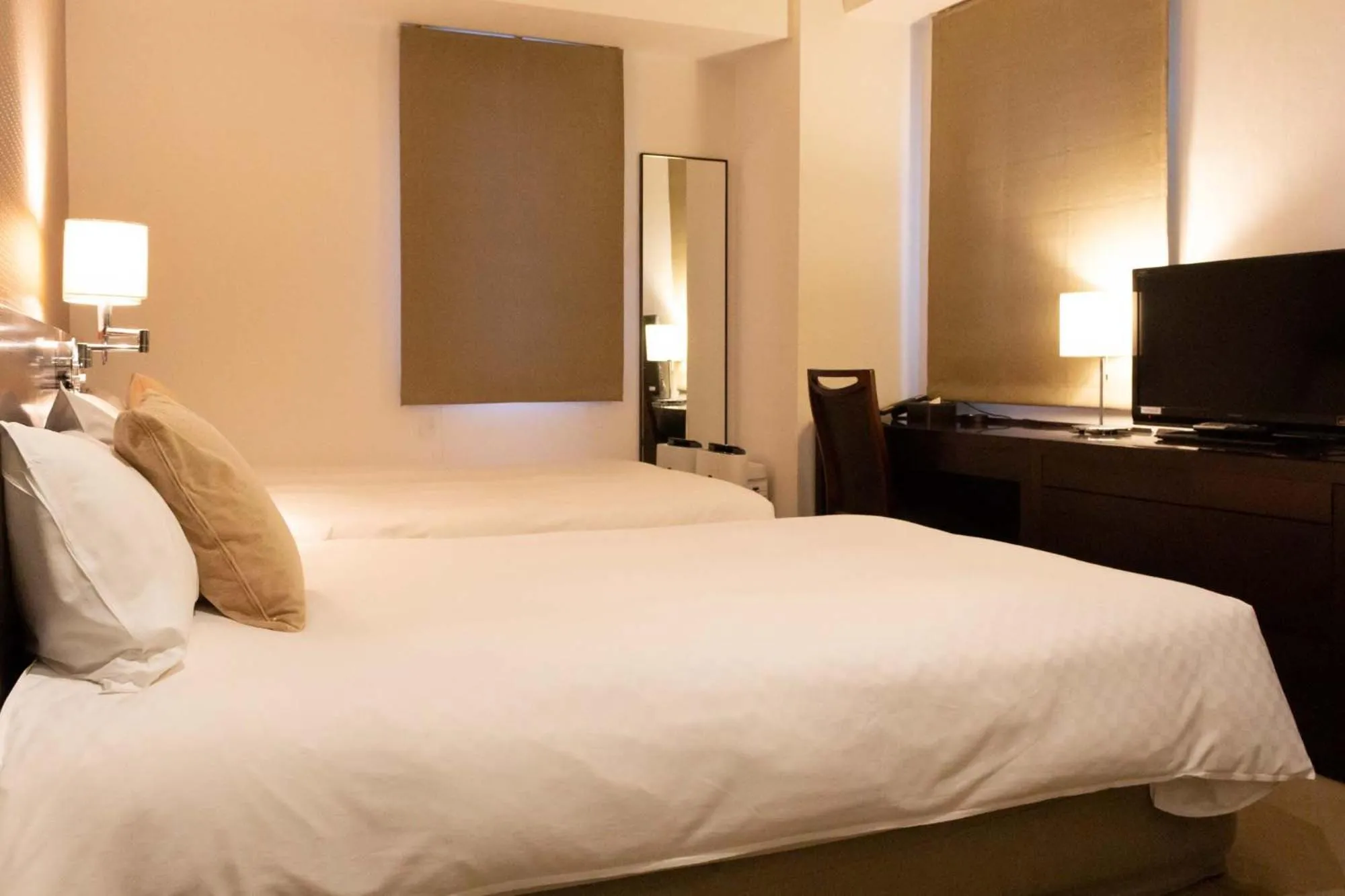 Bed in Hotel Massimo Mishima