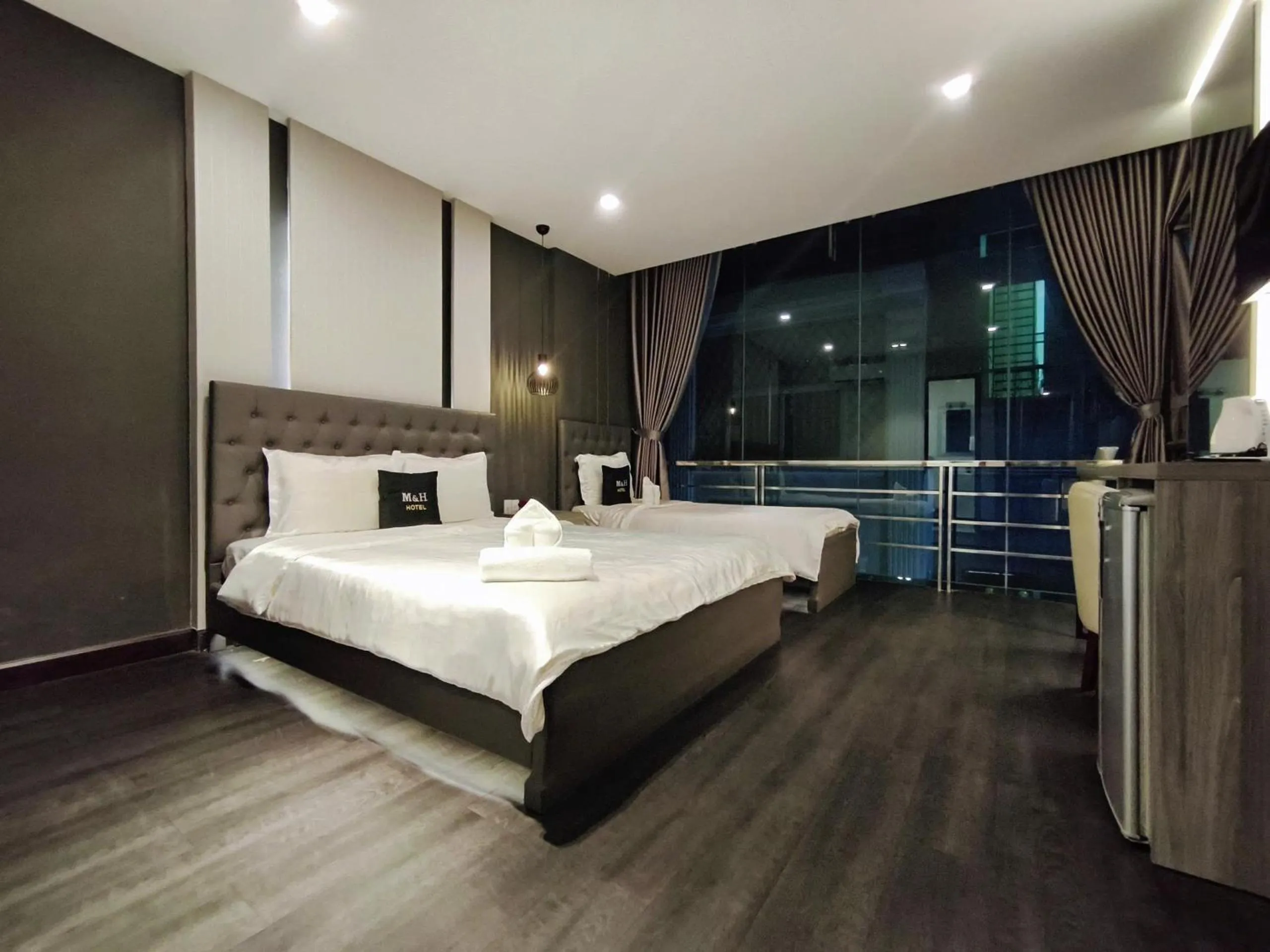 Photo of the whole room, Bed in M&H Hotel