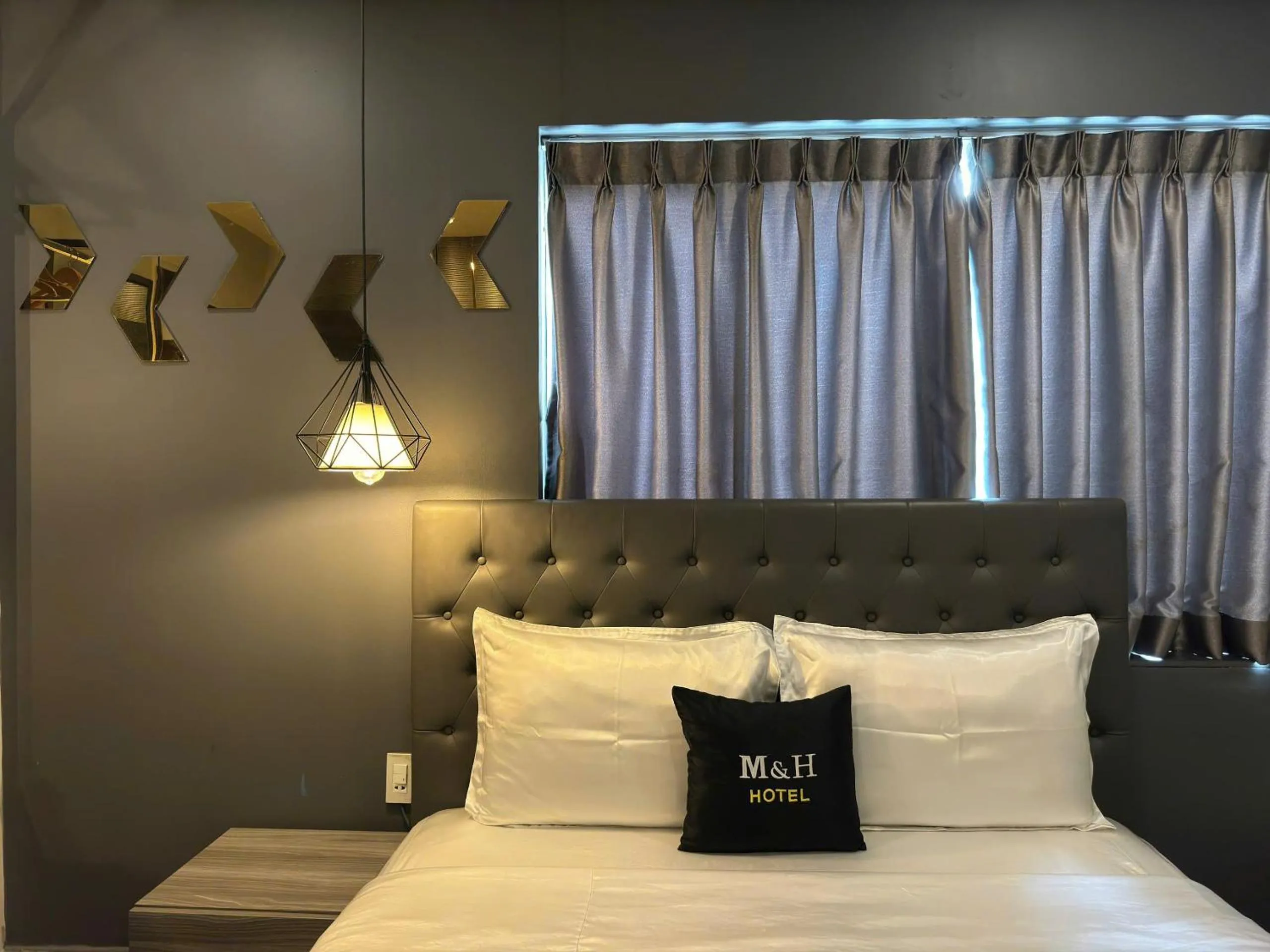 Photo of the whole room, Bed in M&H Hotel