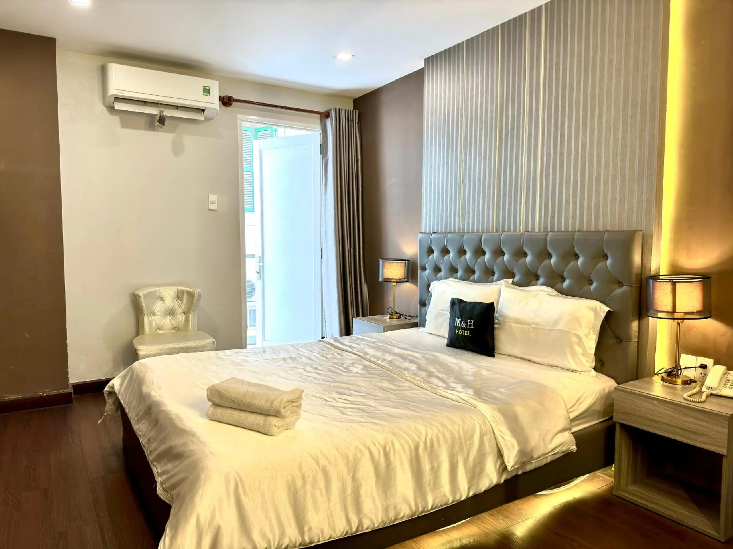 Photo of the whole room, Bed in M&H Hotel