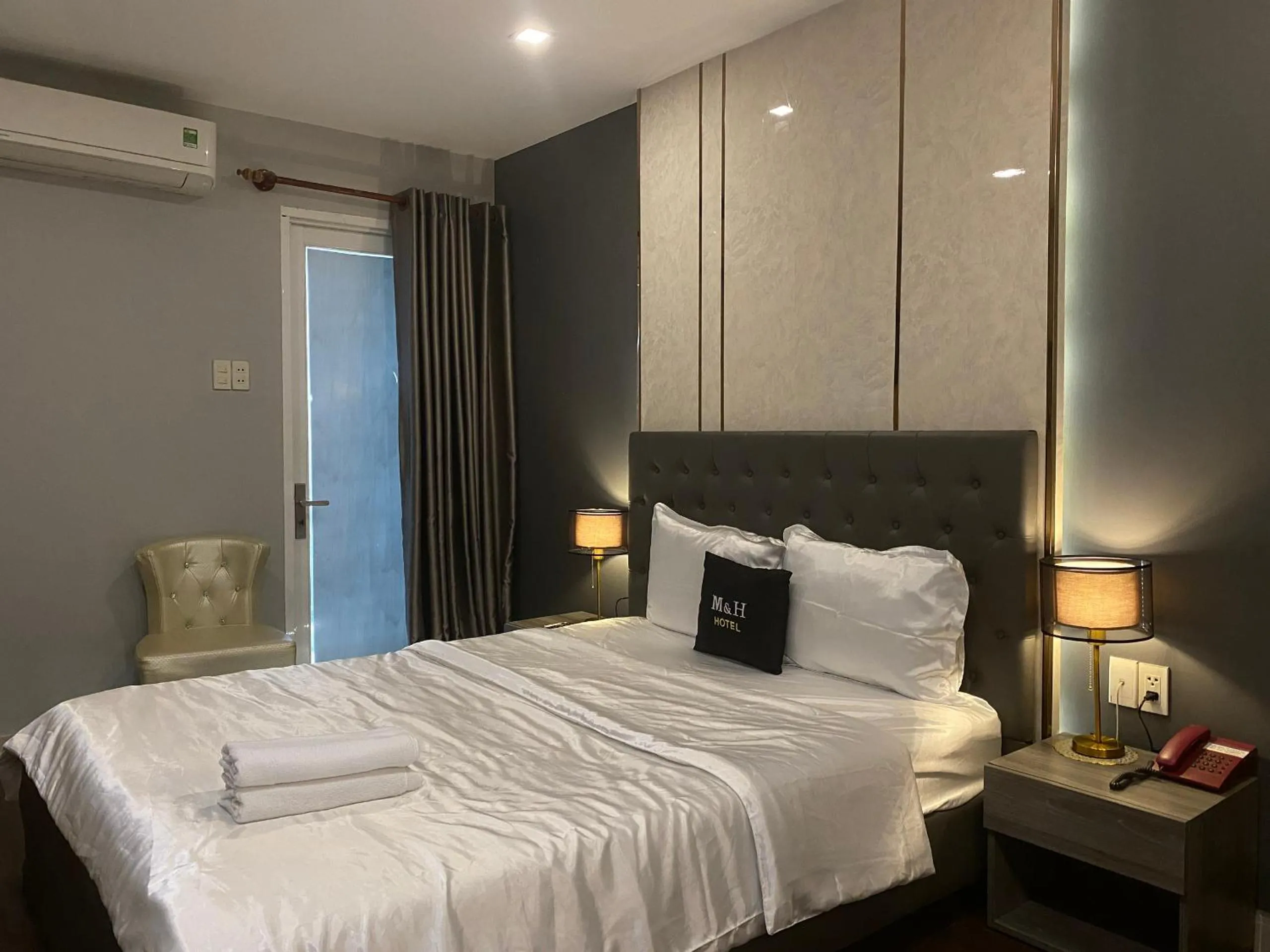 Photo of the whole room, Bed in M&H Hotel