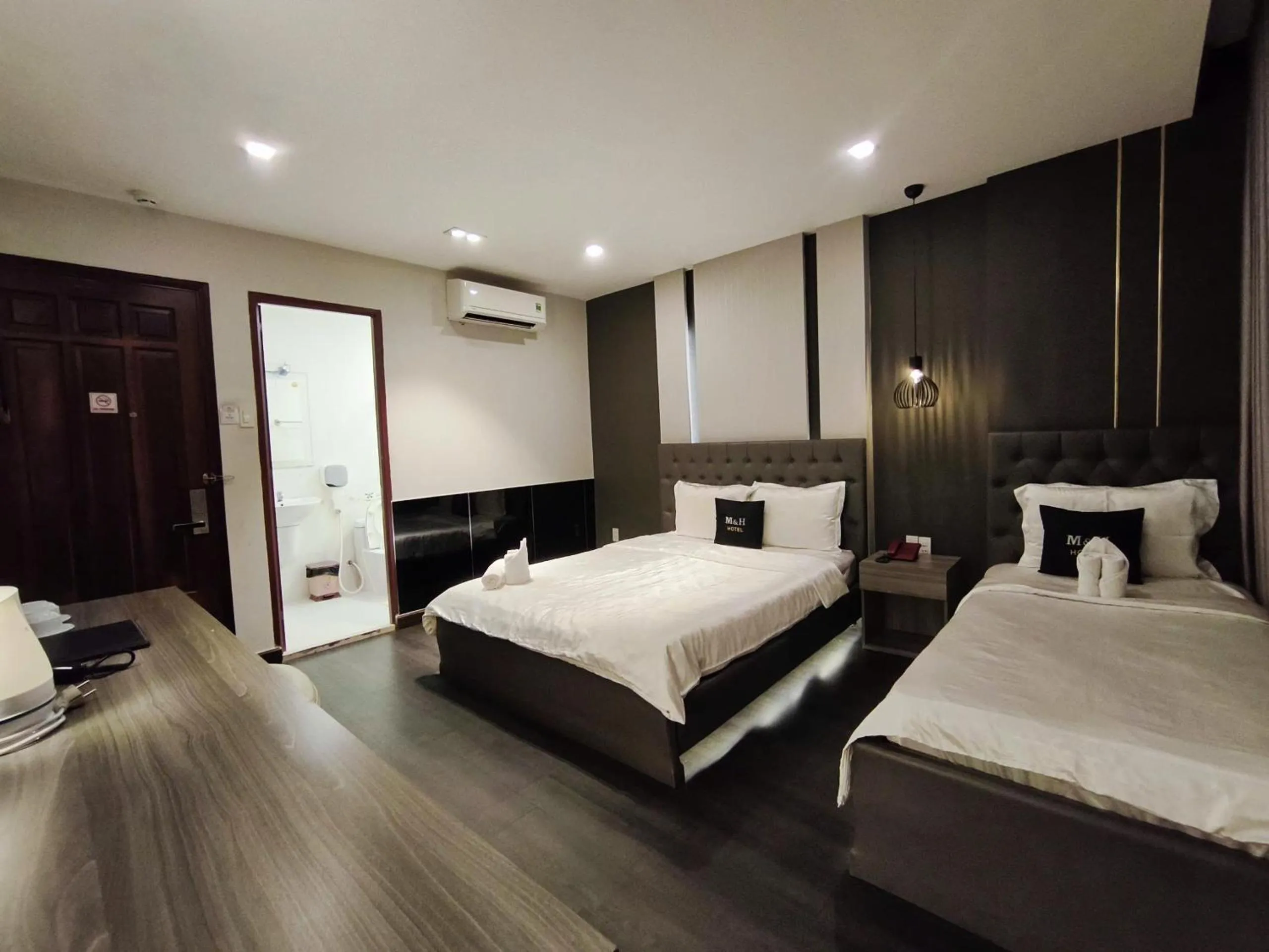 Photo of the whole room, Bed in M&H Hotel