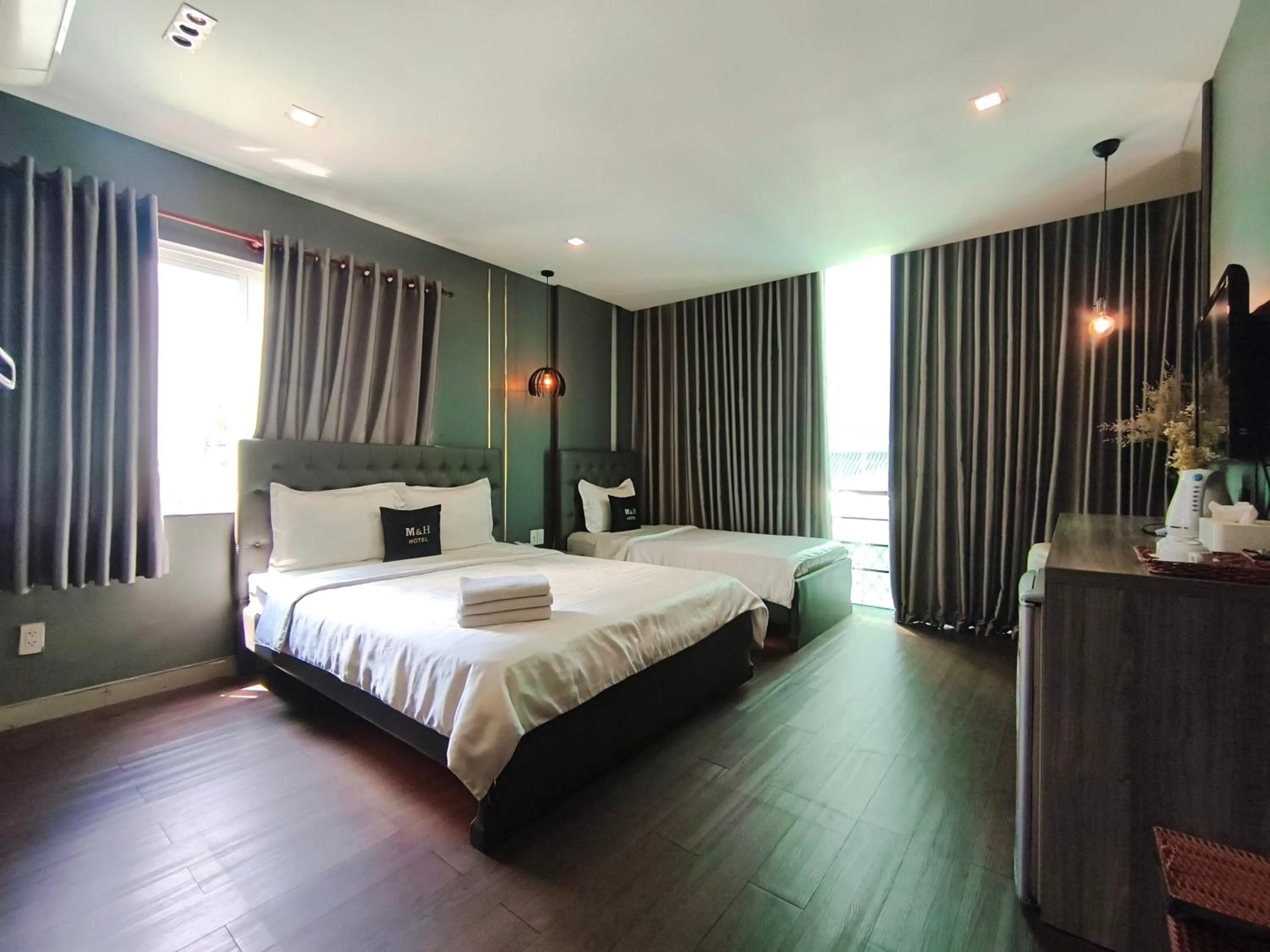 Photo of the whole room, Bed in M&H Hotel