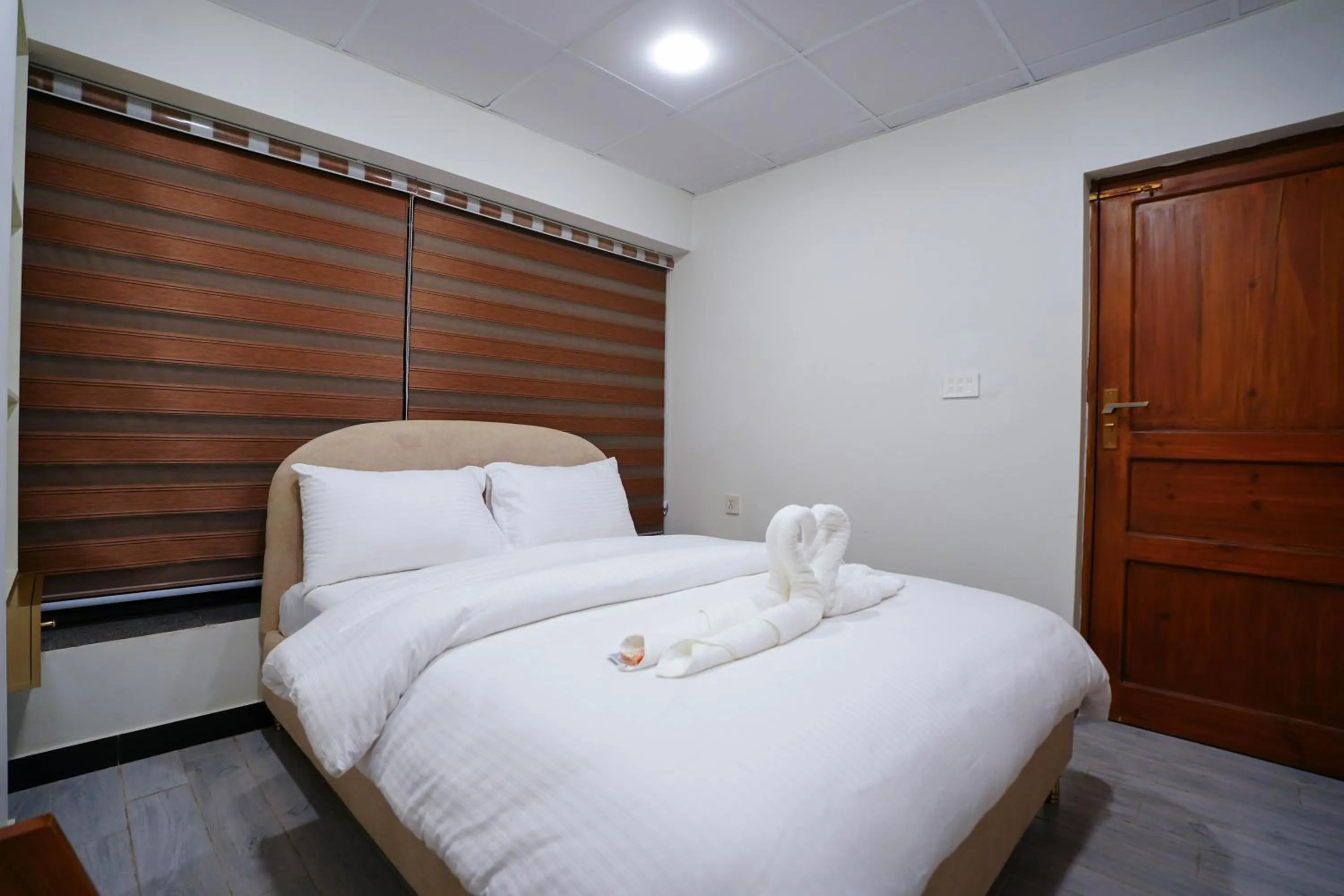 Bed in Luxvill Hotel