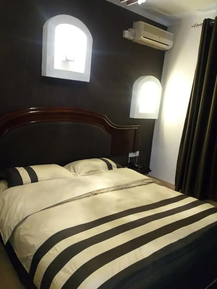 Bed in Emerald Hotel Kampala