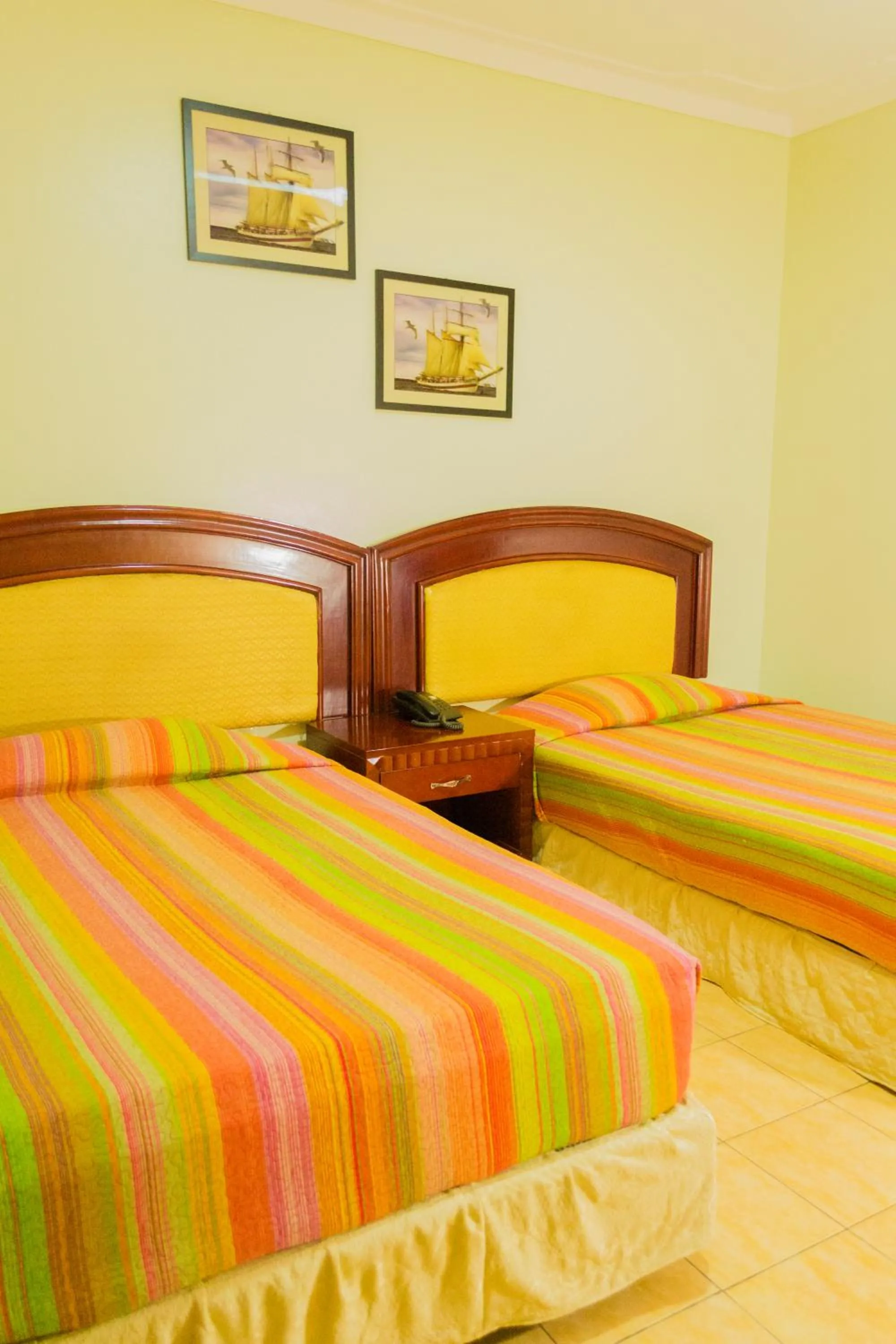 Bed in Emerald Hotel Kampala