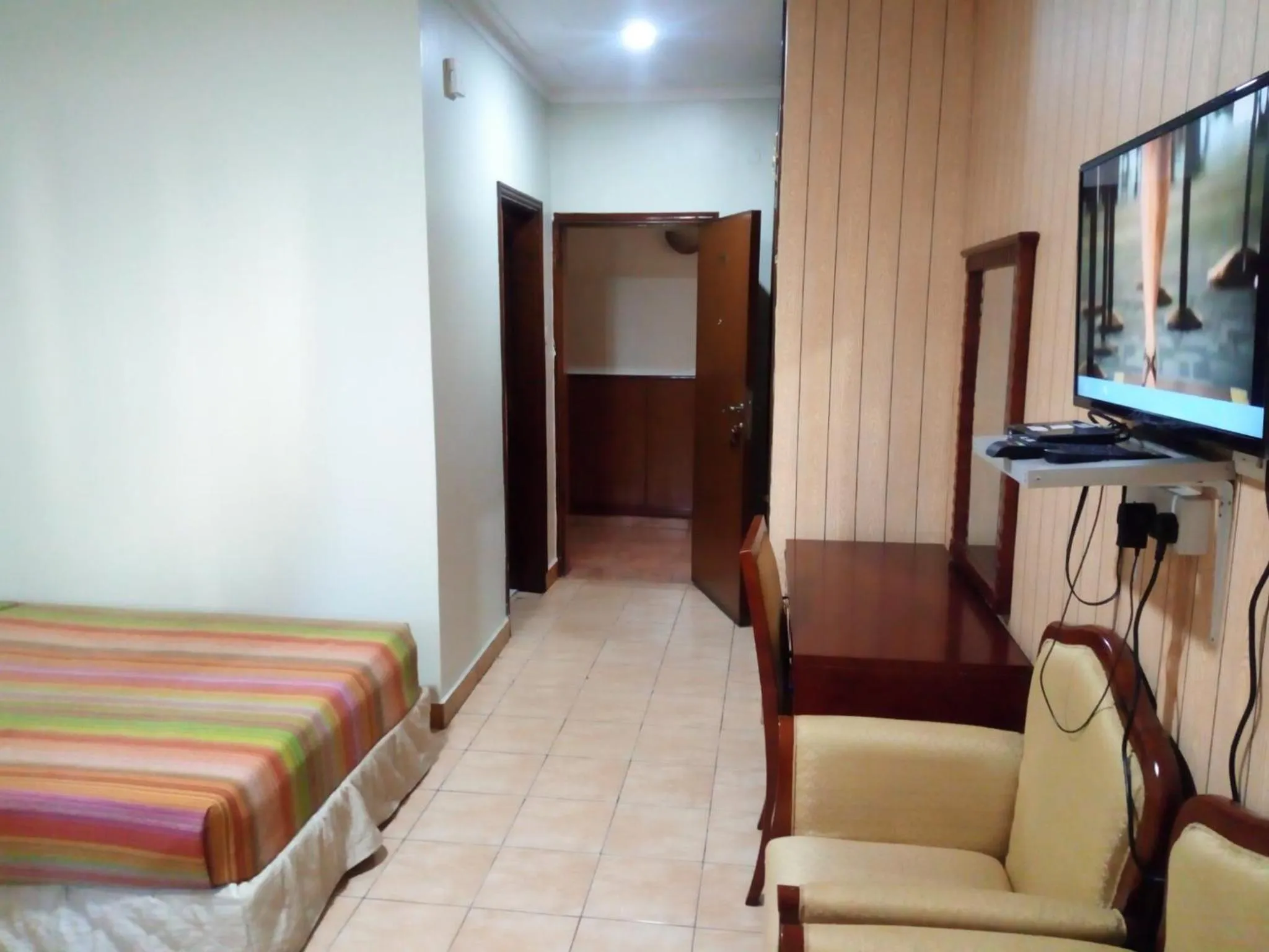 Bed in Emerald Hotel Kampala