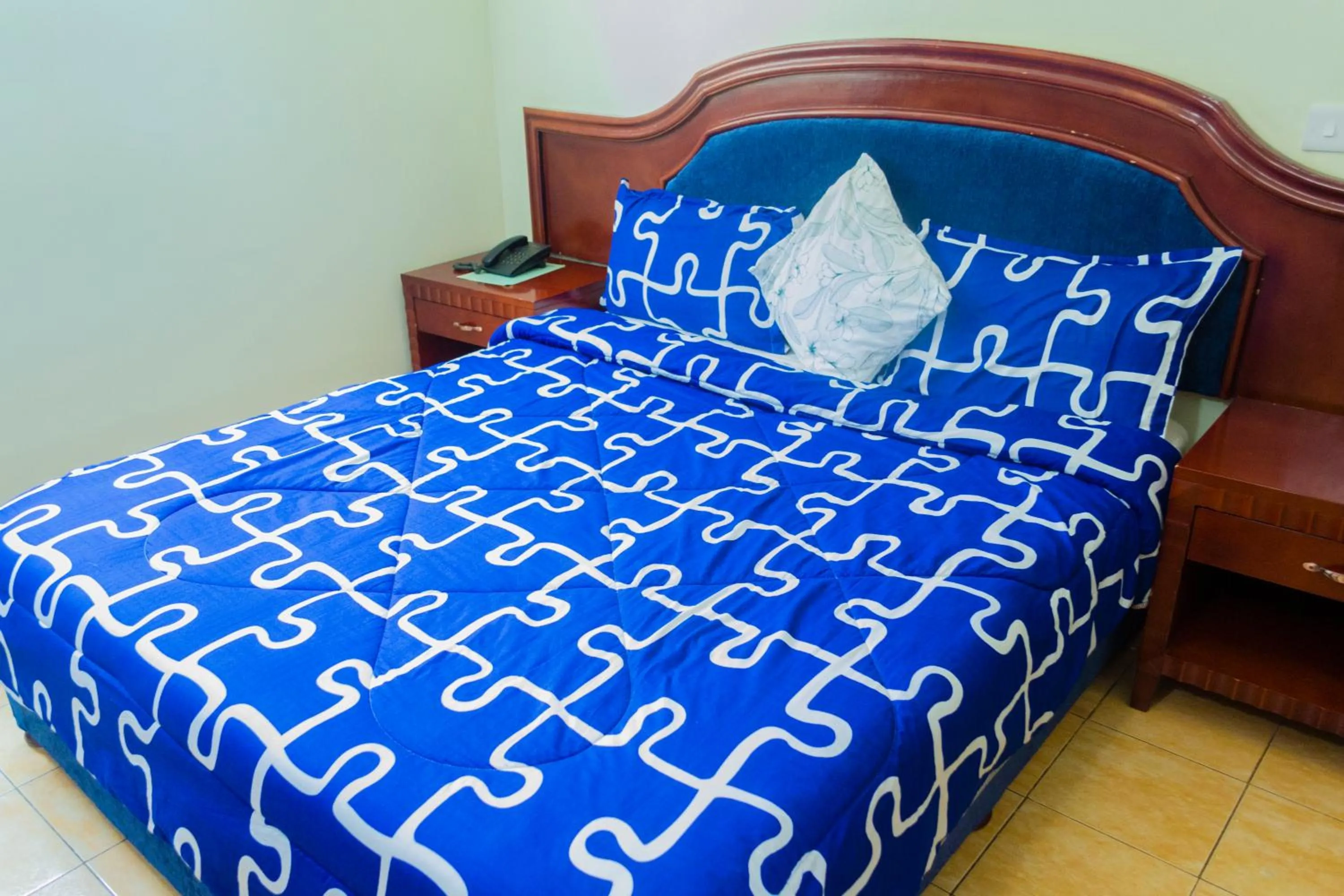 Bed in Emerald Hotel Kampala