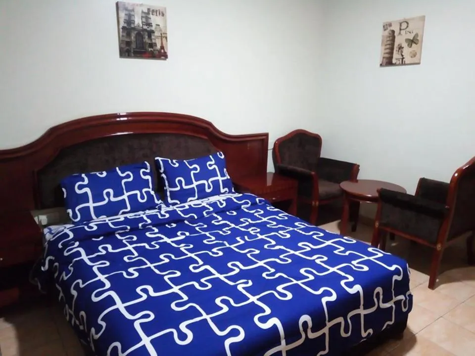Bed in Emerald Hotel Kampala