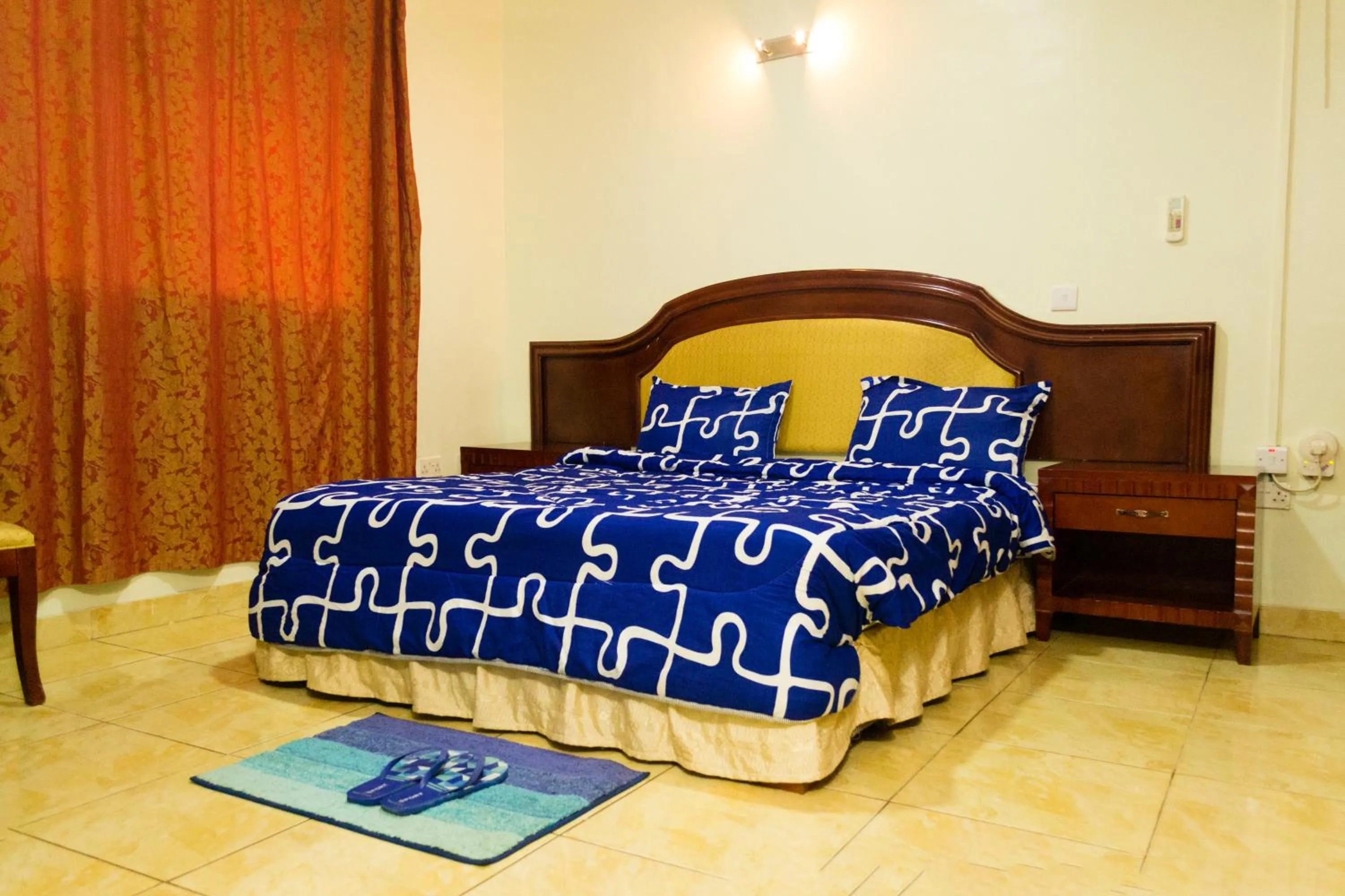 Bed in Emerald Hotel Kampala