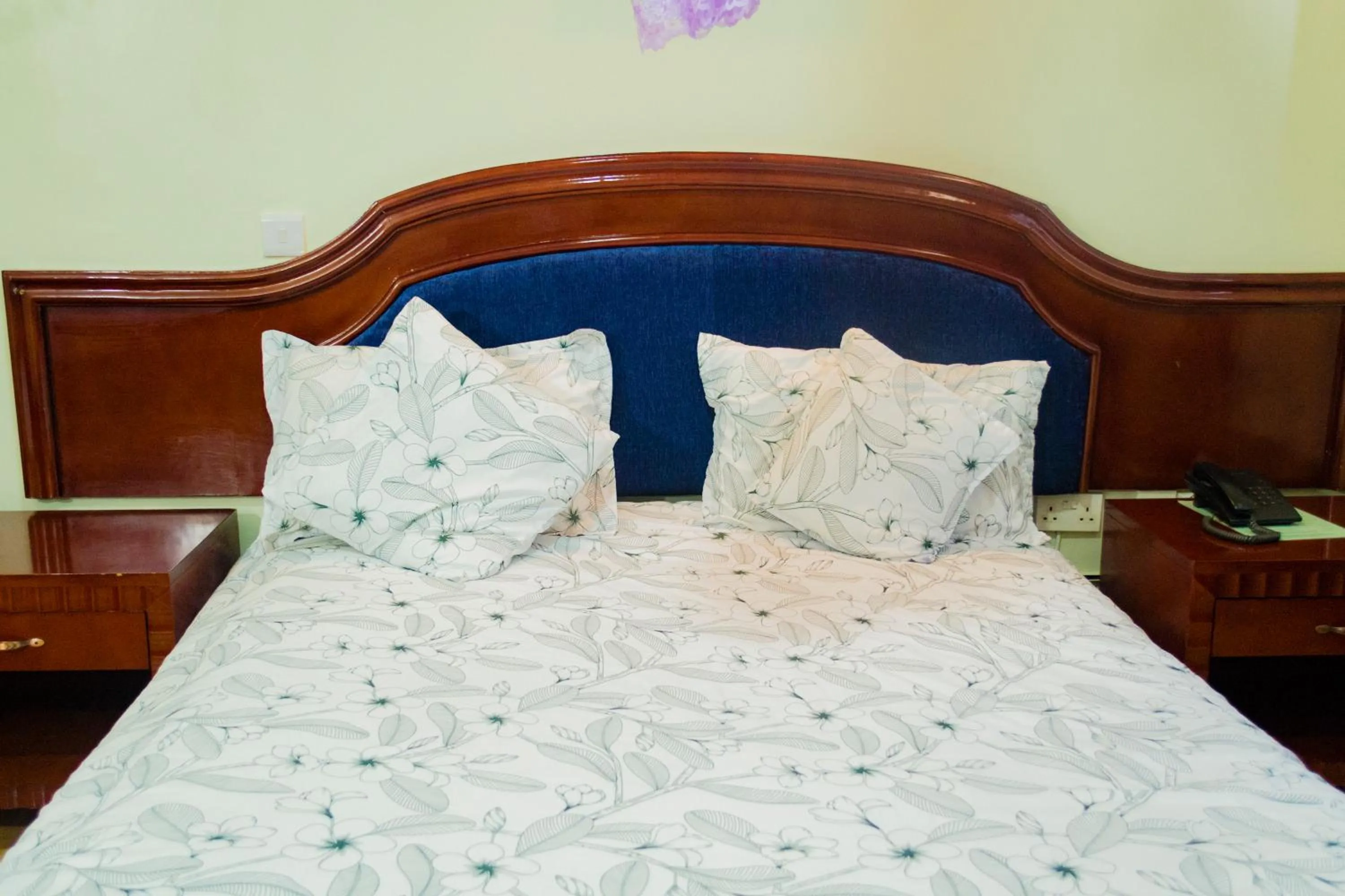 Bed in Emerald Hotel Kampala