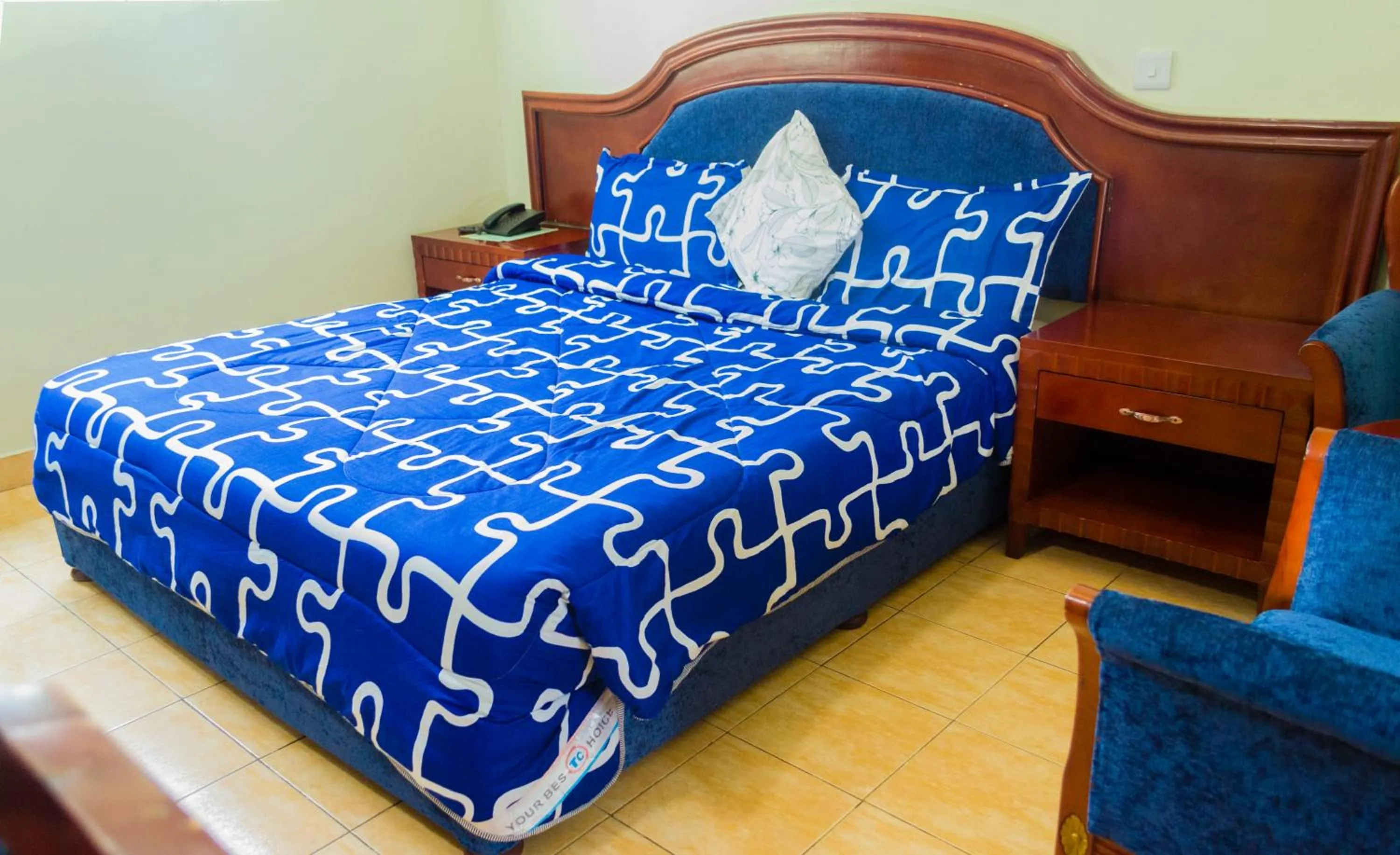 Bed in Emerald Hotel Kampala