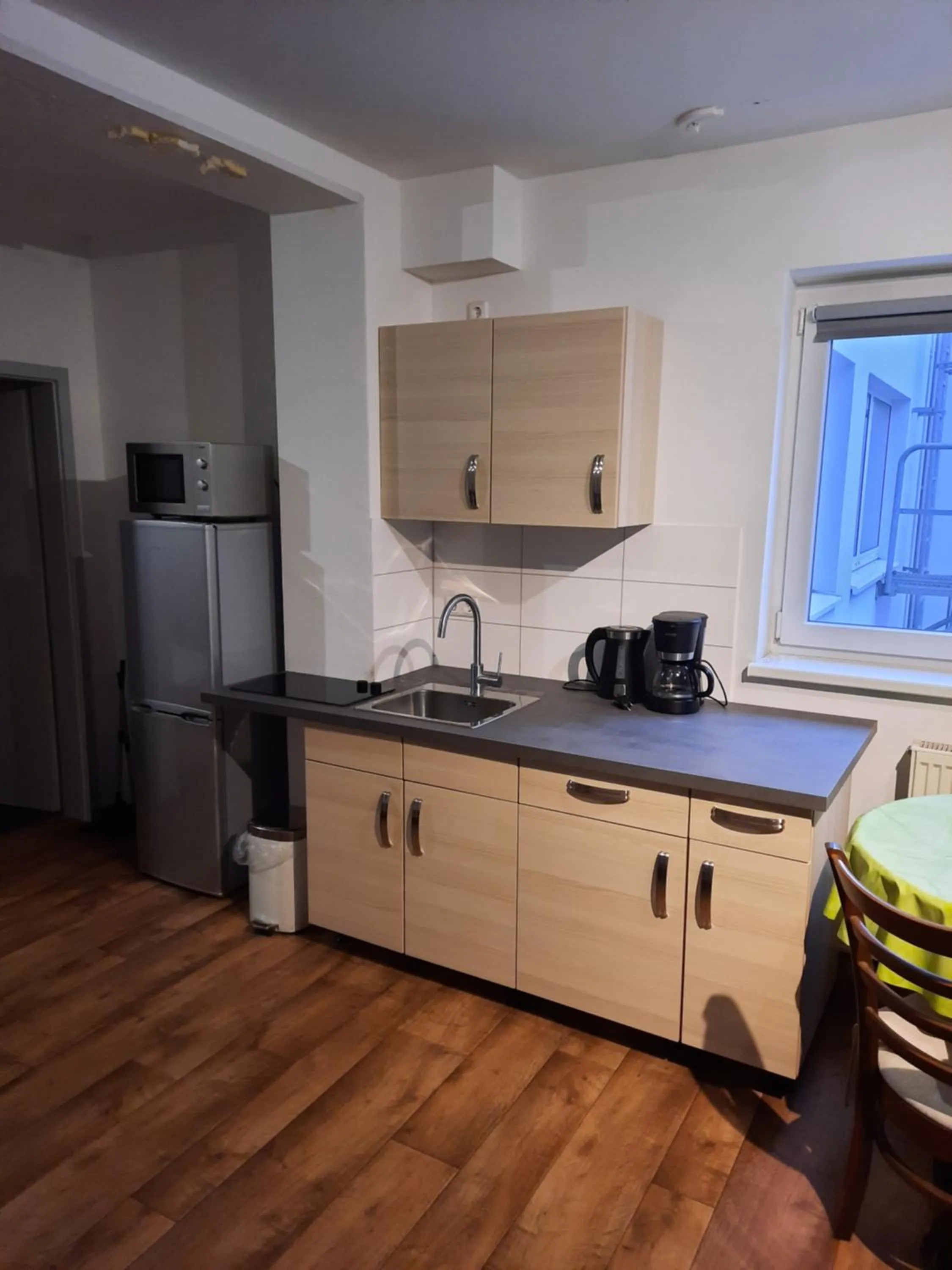 Kitchen or kitchenette in City Apartments Magdeburg