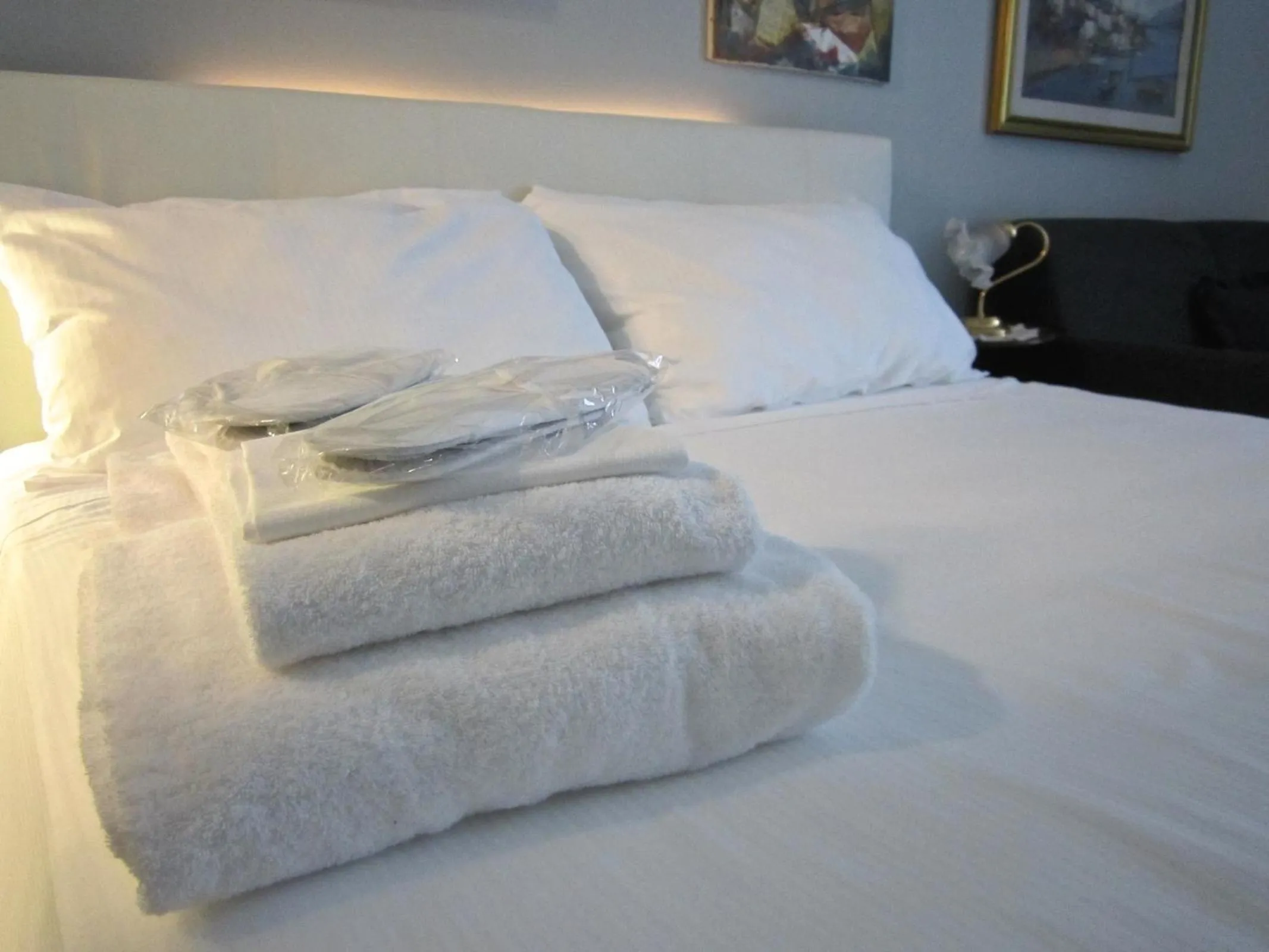 Bed in Aiello Suites Executive