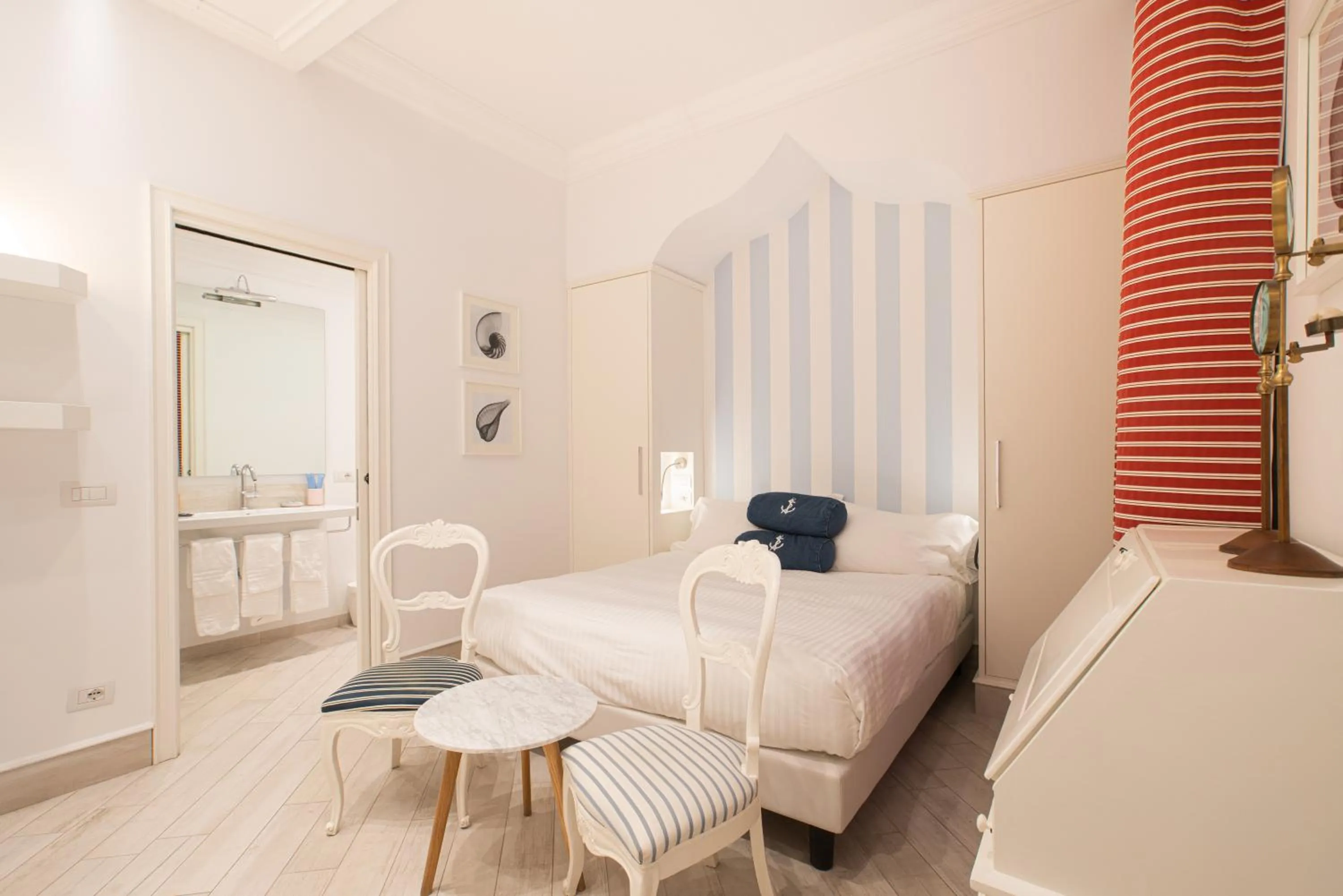 Bed in Hotel Marina Charming Rooms