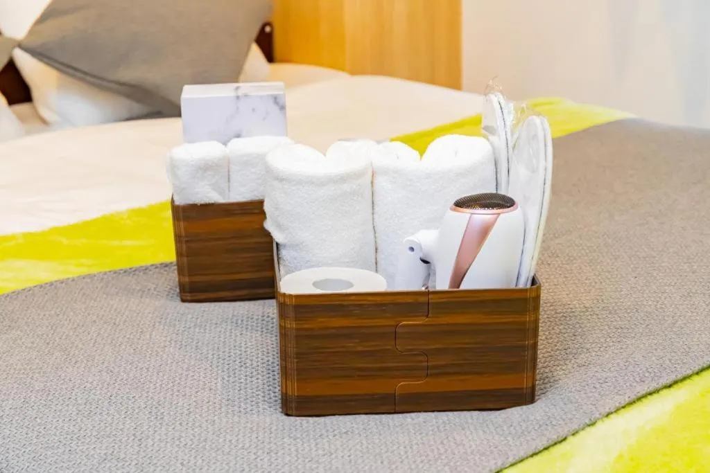 towels, Bed in JA Hotel Betencho