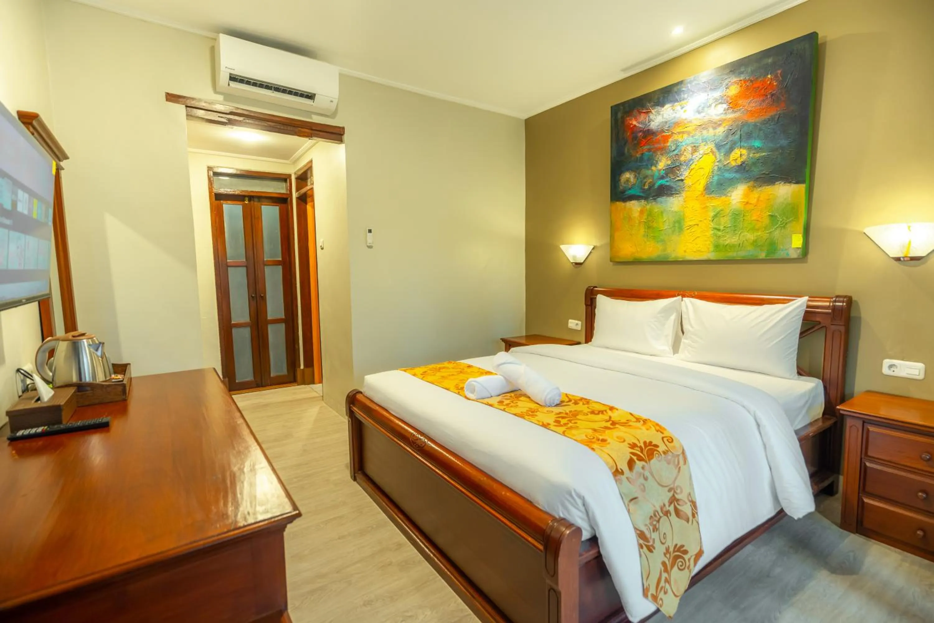 Bedroom, Bed in The Central Lovina Hotel & Restaurant