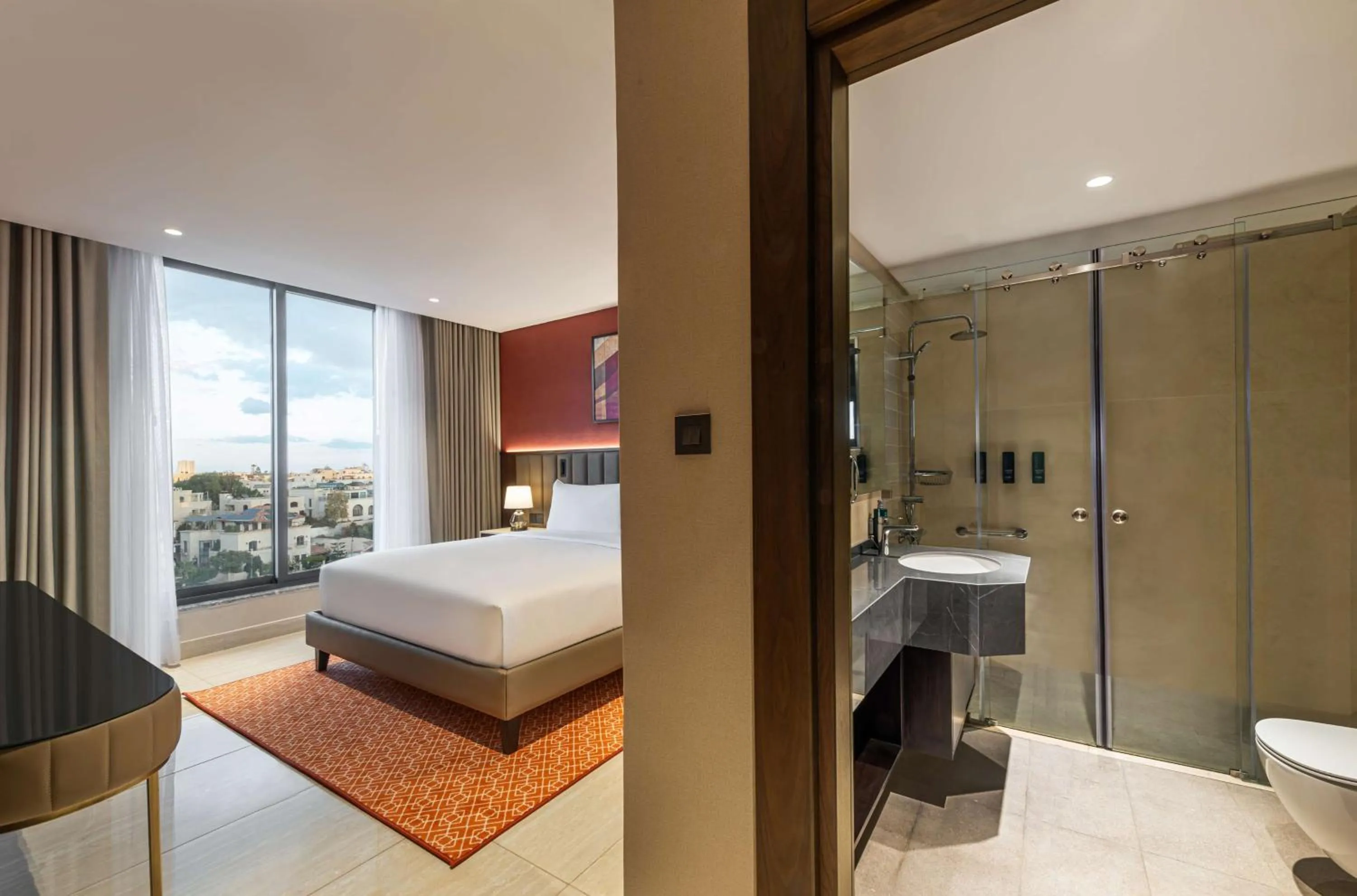 Bathroom, Bed in Doubletree By Hilton Amman Hotel & Residences