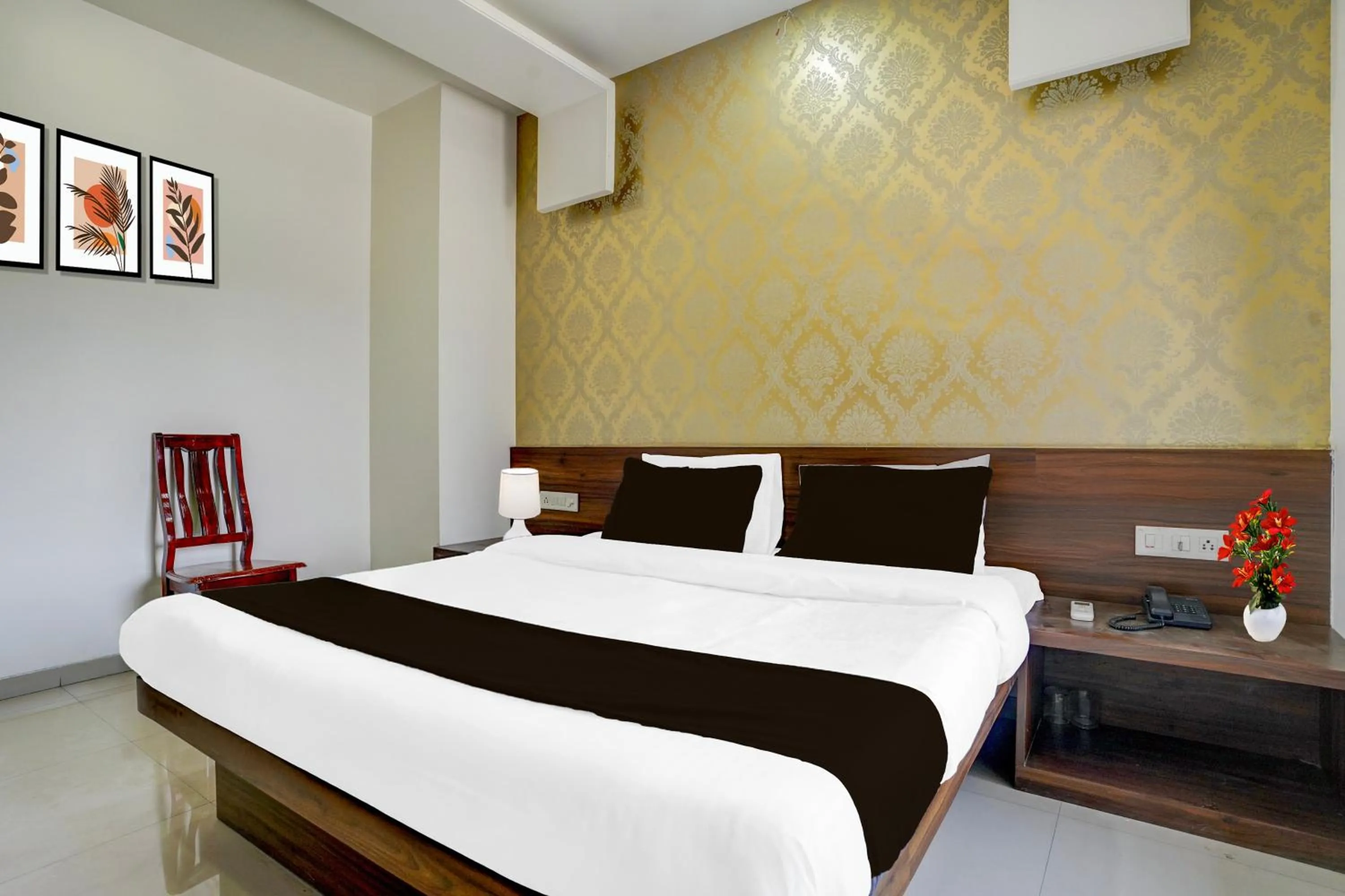 Bedroom, Bed in Super Townhouse Godavari Riverbank Formerly Shanti Datta Inn