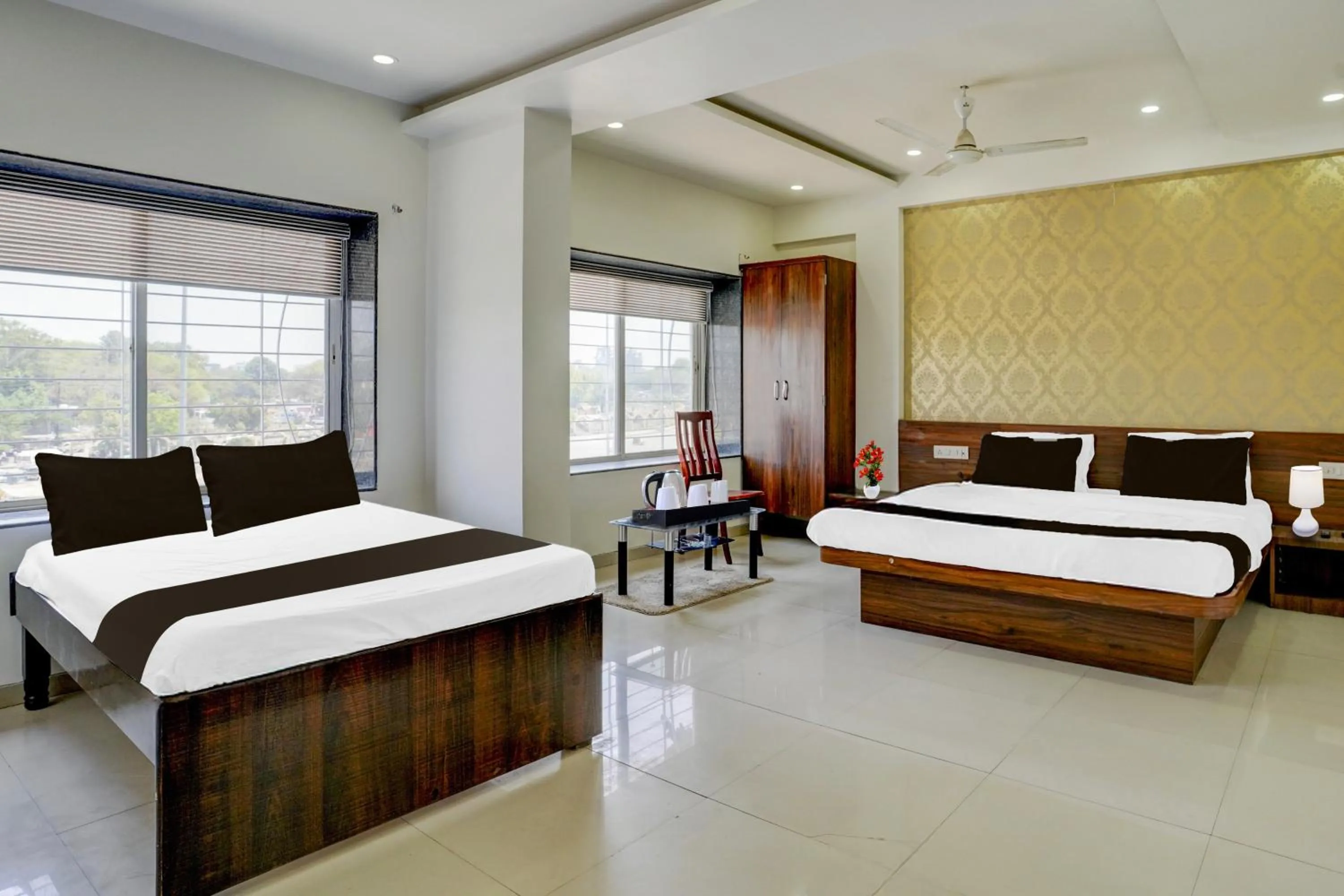 Bedroom, Bed in Super Townhouse Godavari Riverbank Formerly Shanti Datta Inn