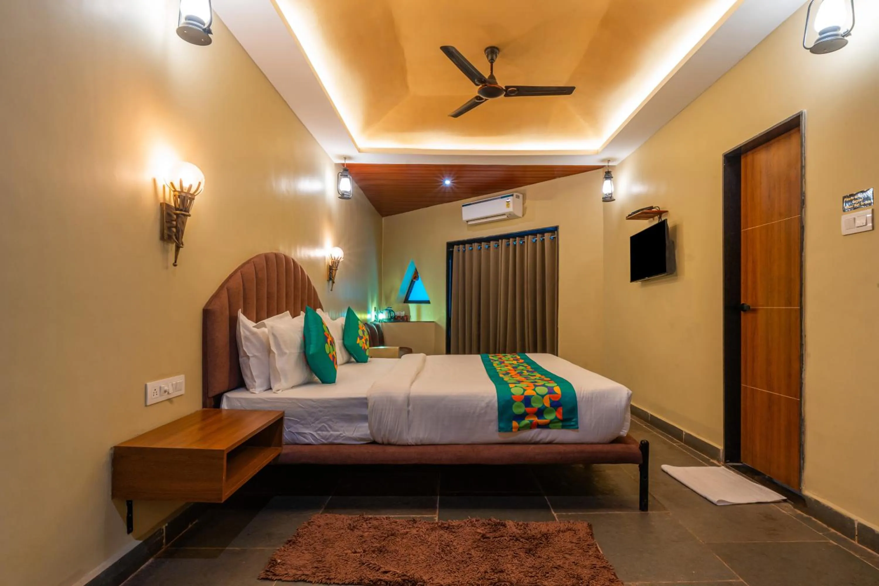 Bedroom, Bed in Treebo Premium Mowgli's Den, Pench