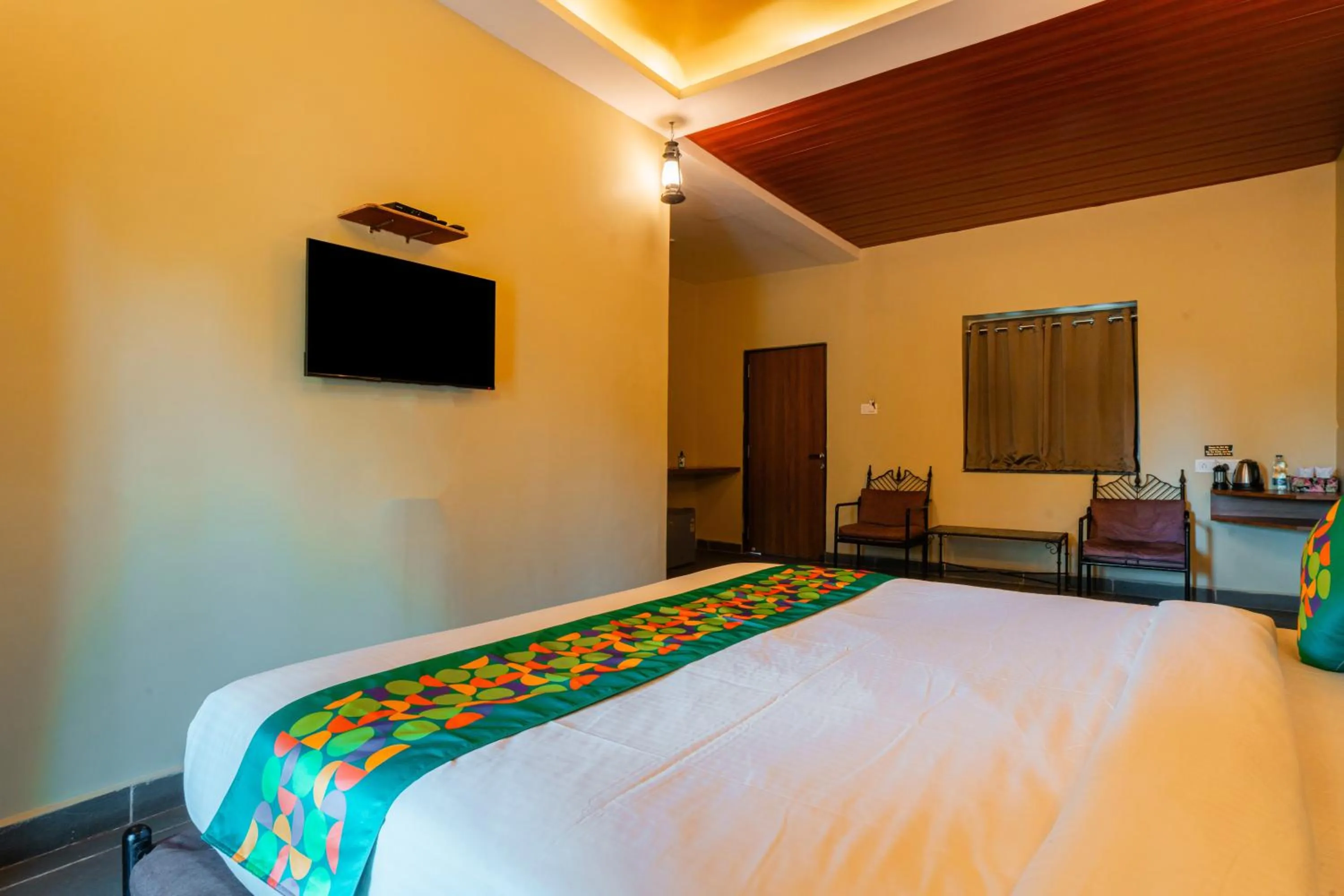 Bedroom, Bed in Treebo Premium Mowgli's Den, Pench
