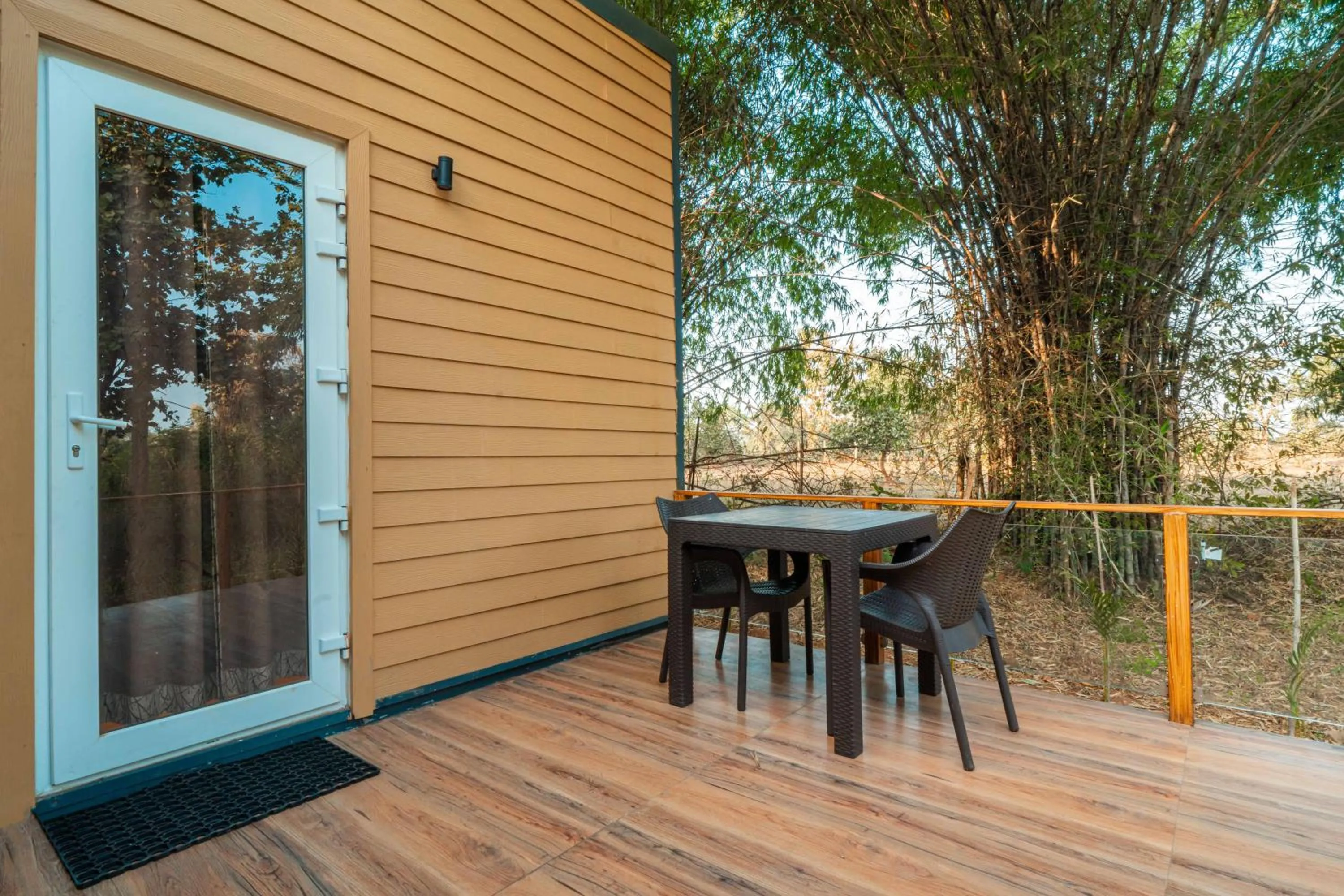 Seating area in Treebo Premium Mowgli's Den Pench with Swimming Pool