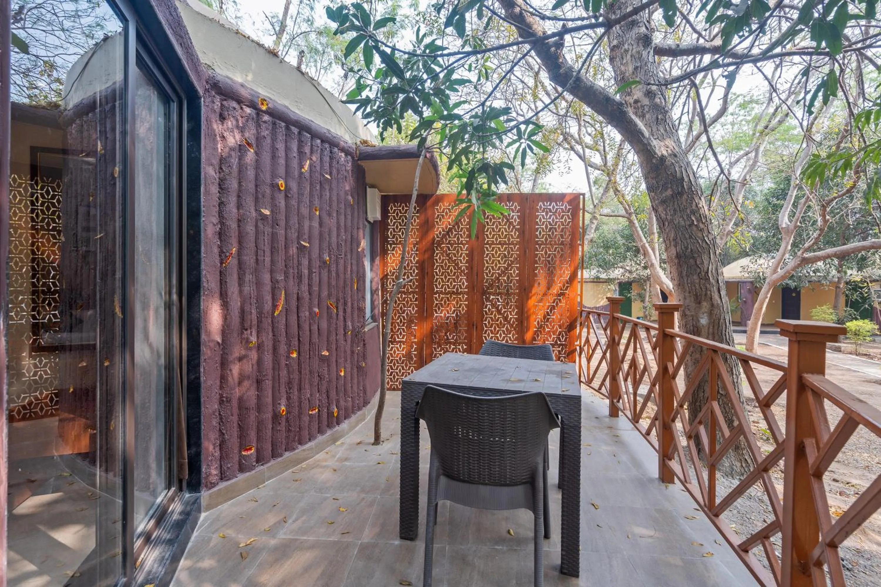 Seating area in Treebo Premium Mowgli's Den Pench with Swimming Pool