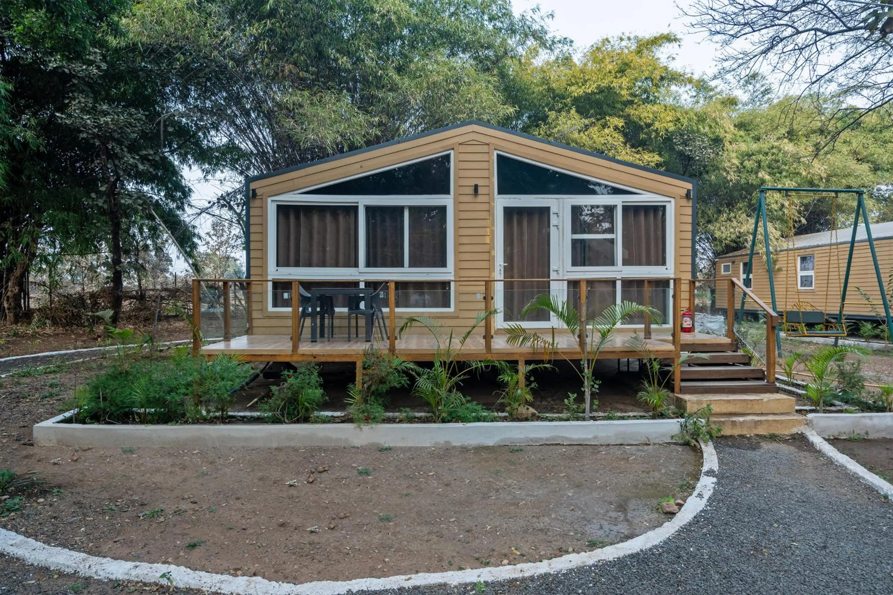 Property building in Treebo Premium Mowgli's Den Pench with Swimming Pool