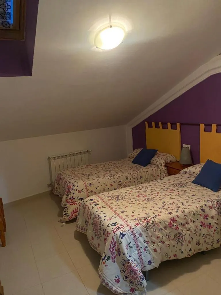 Bedroom, Bed in Hostal y Apartamentos la Vereda