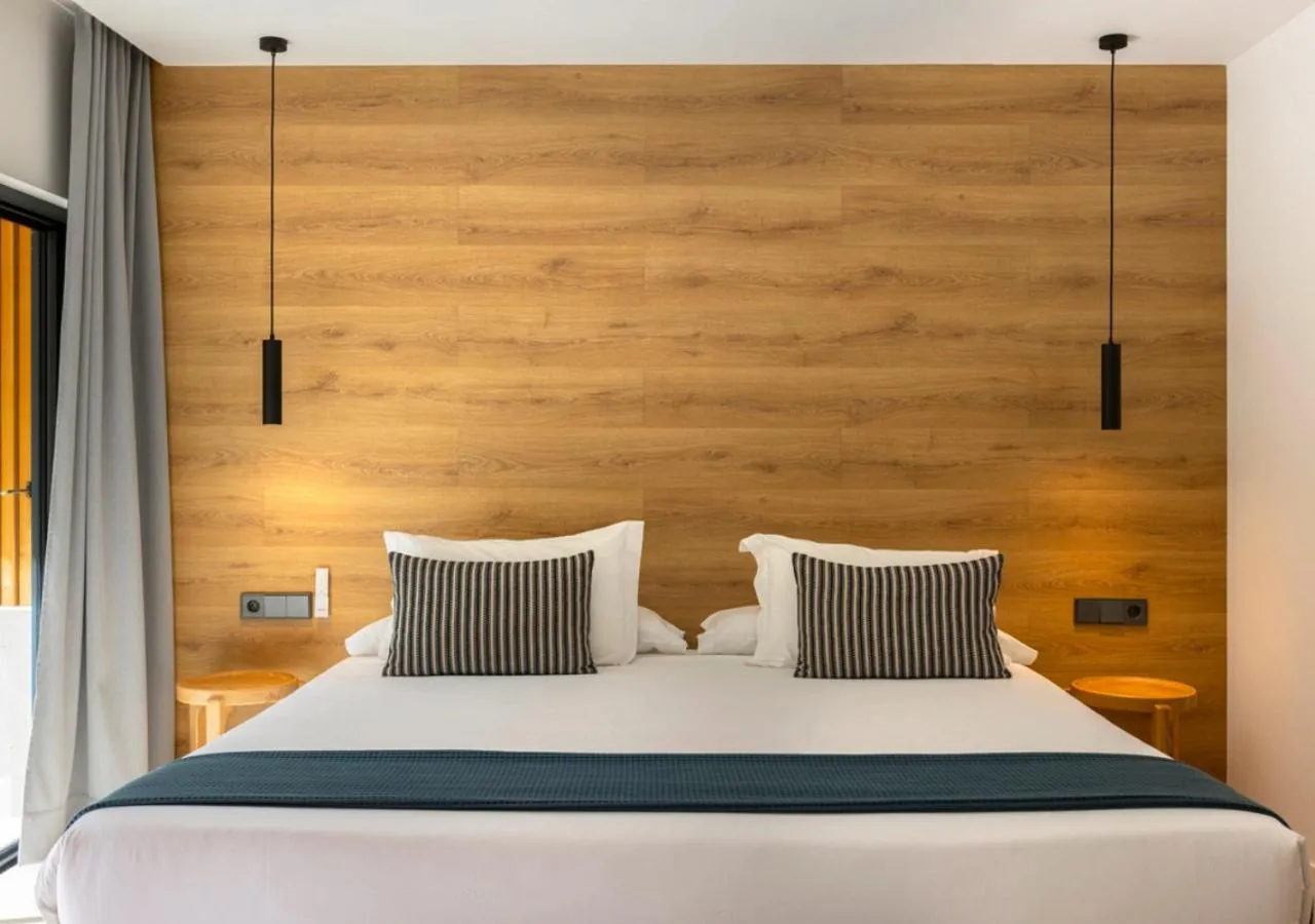 Bed in Las Gaviotas Suites Hotel & Spa