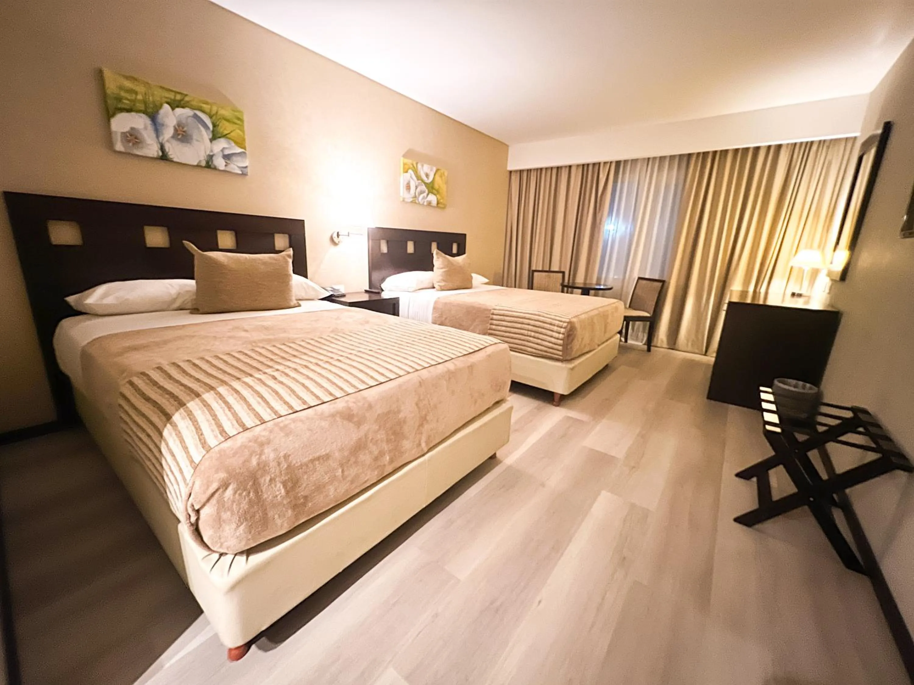 Bed in Howard Johnson Hotel & Resort Funes