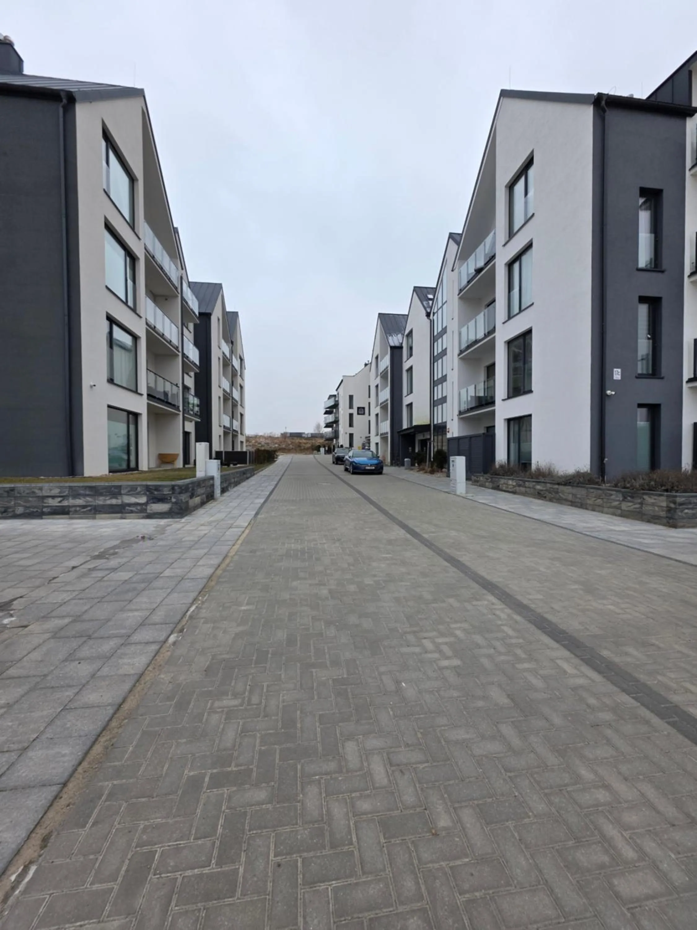 Property building in Szprotka Apartment with Air-Conditioning & Parking by Noclegi Renters