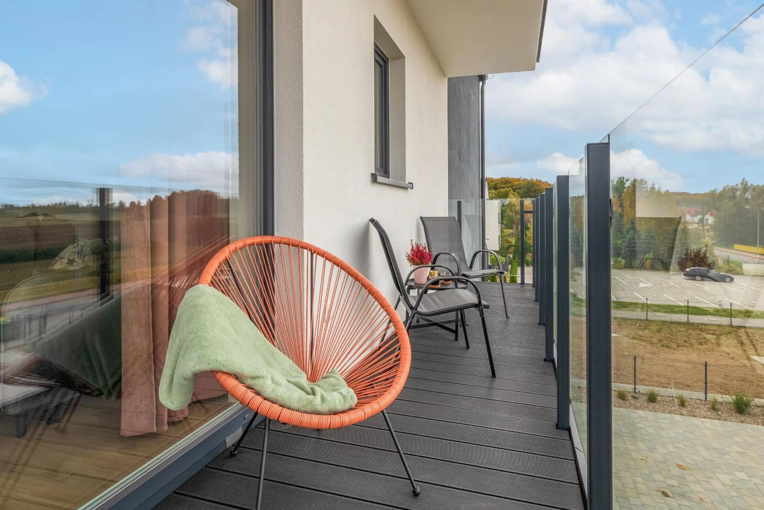 Balcony/Terrace in Szprotka Apartment with Air-Conditioning & Parking by Noclegi Renters